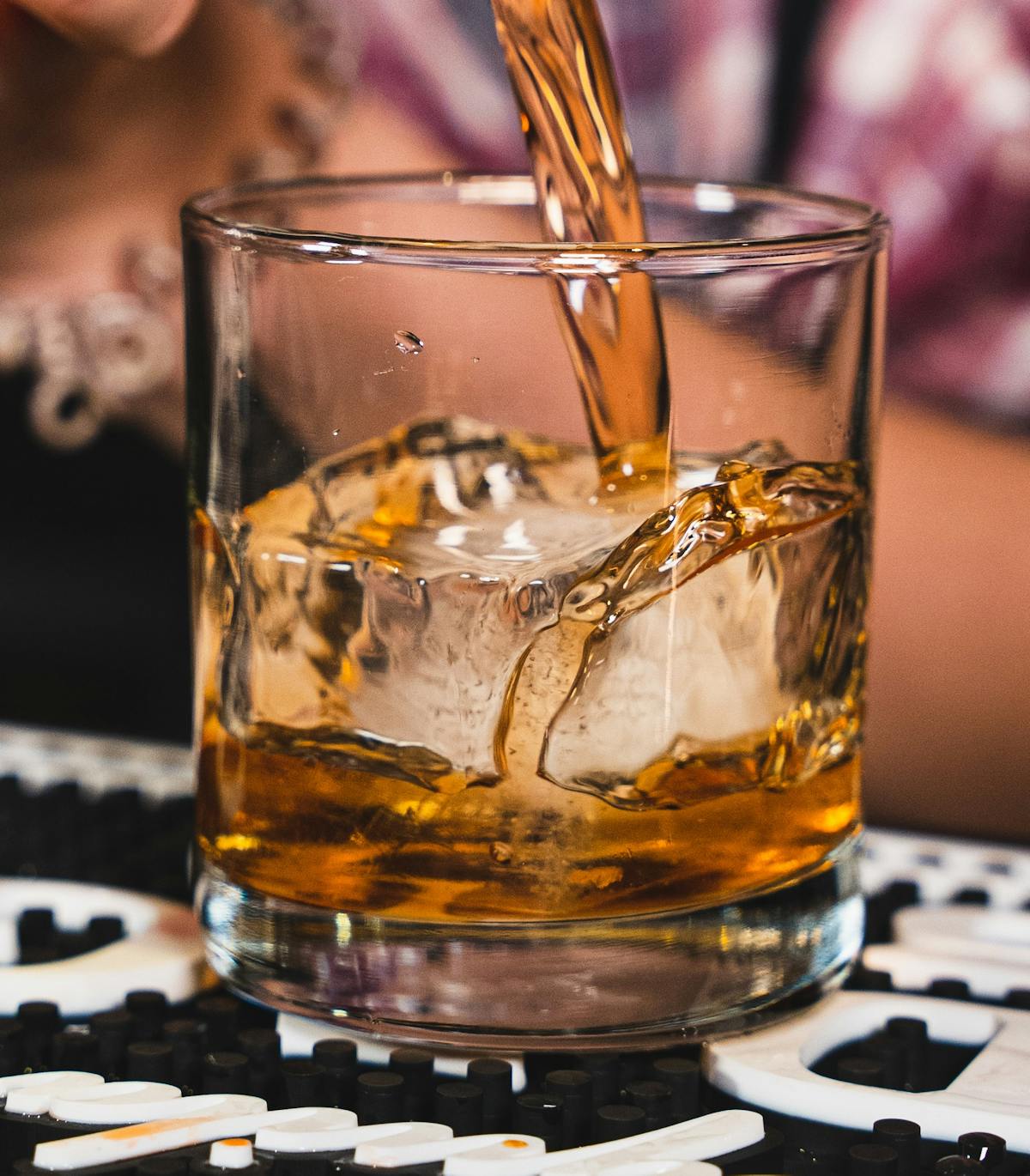 a glass of beer on a table