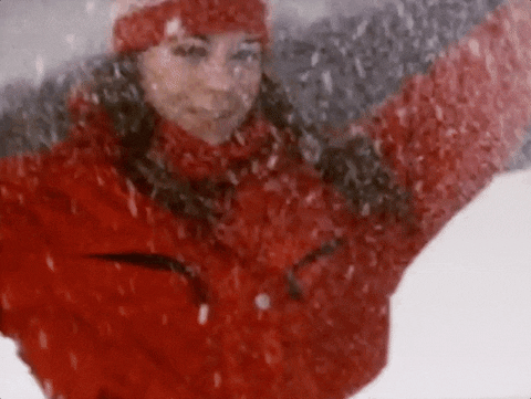 Mariah Carey playing in the snow