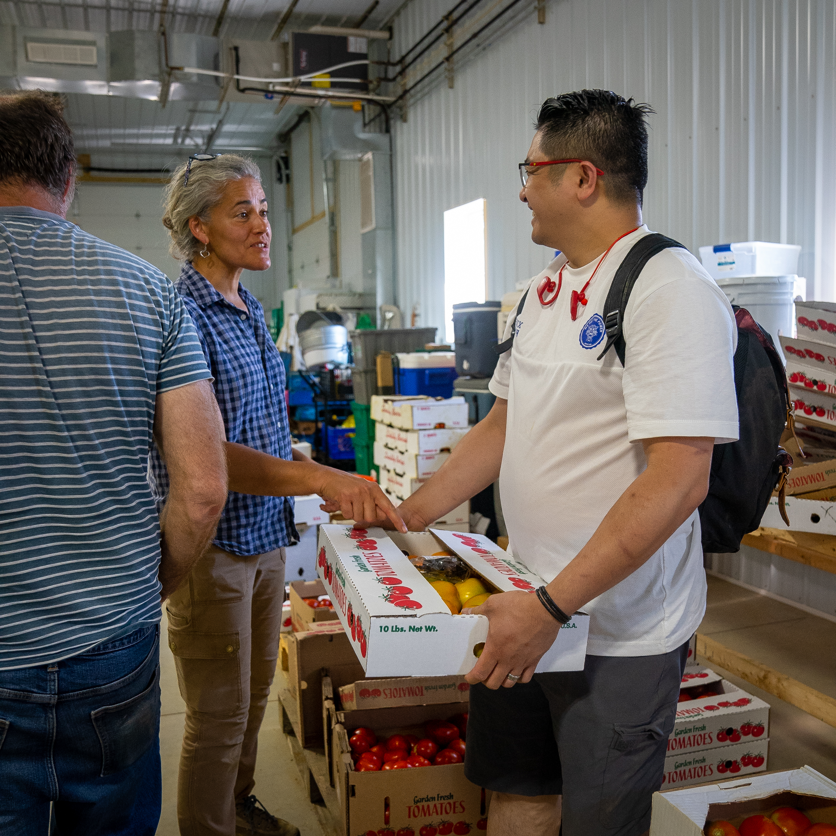 a man standing on top of a cutting board with a cake