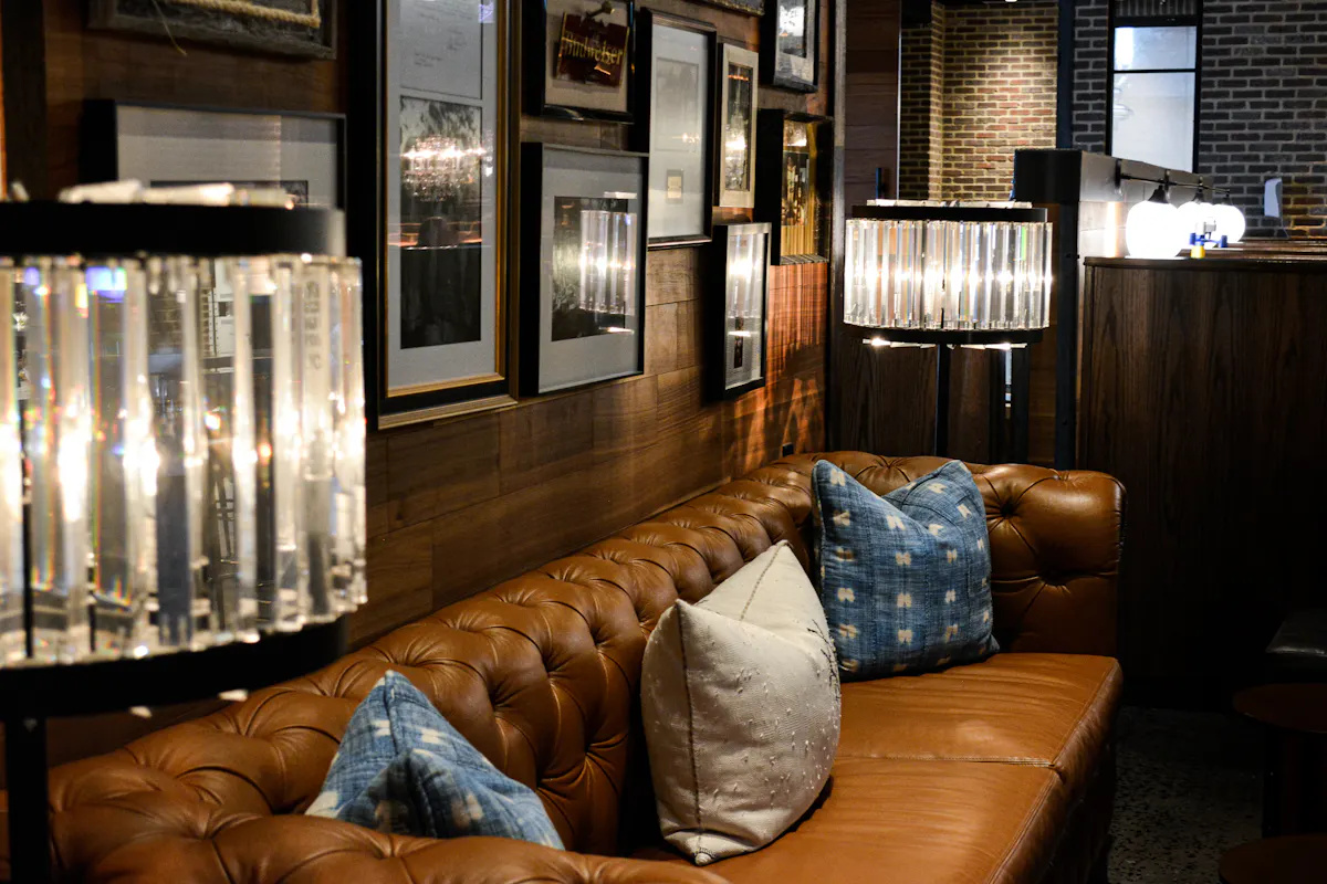 a living room filled with furniture and a large window