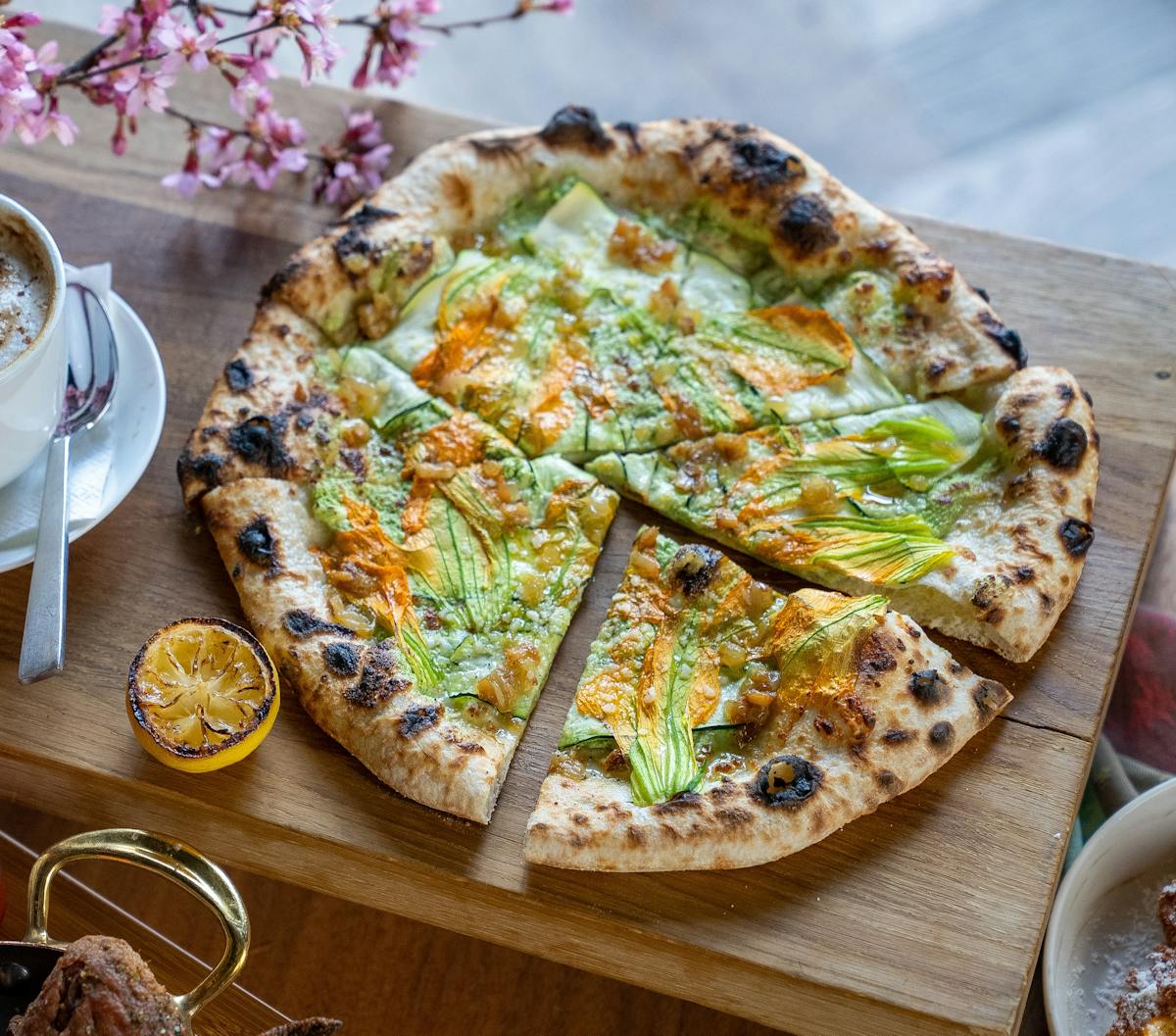 a pizza sitting on top of a table