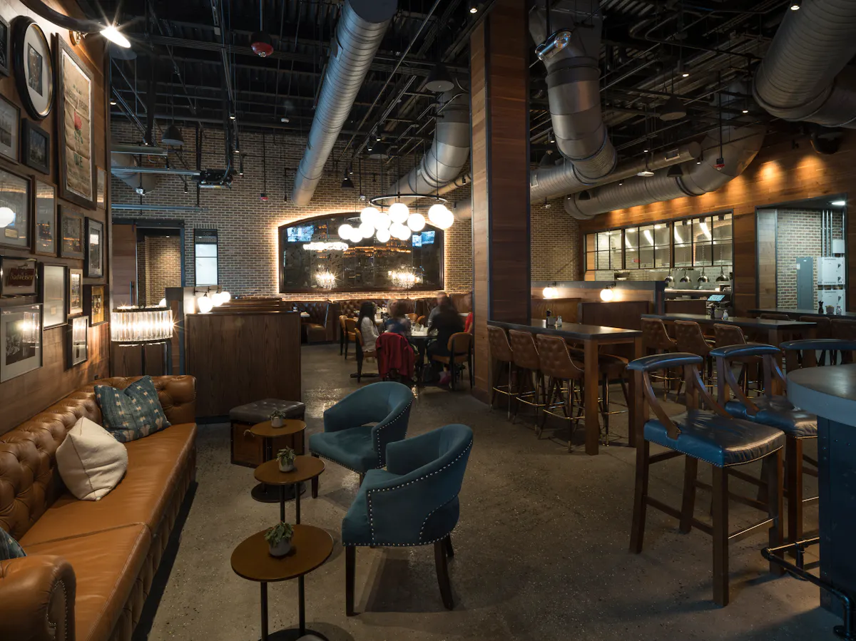 a room filled with furniture and a table in a restaurant