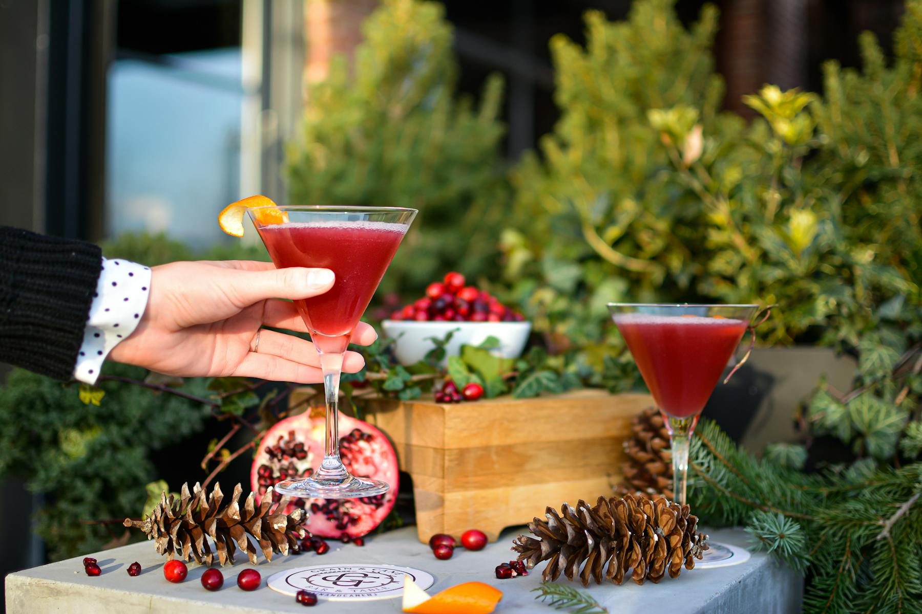 a person sitting at a table with a cake