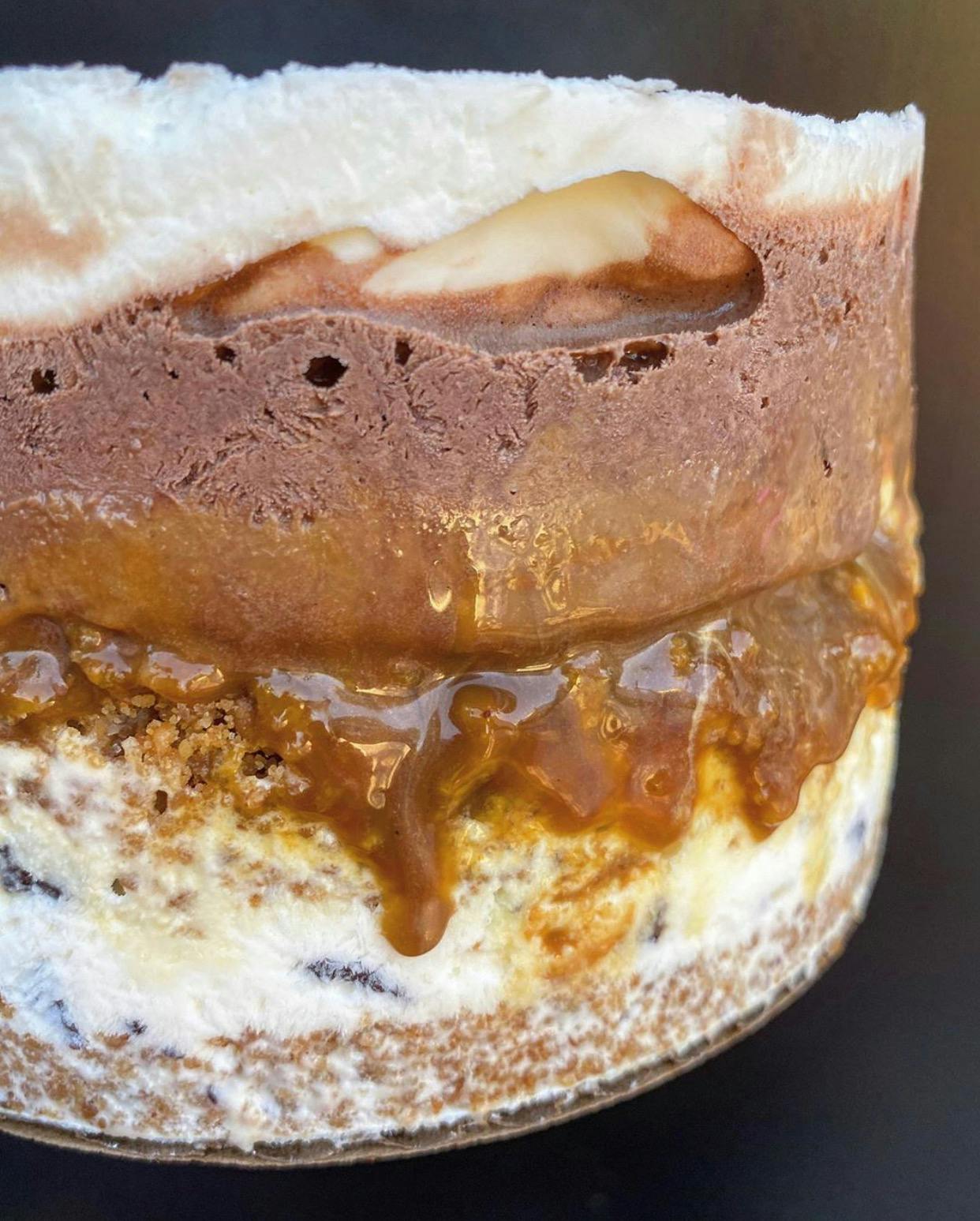 a close up of a piece of cake and ice cream