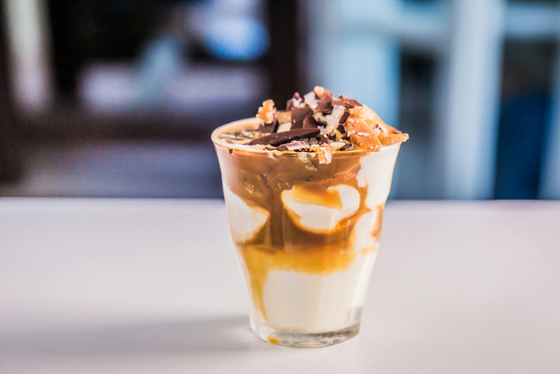 a closeup of a cup filled with ice cream