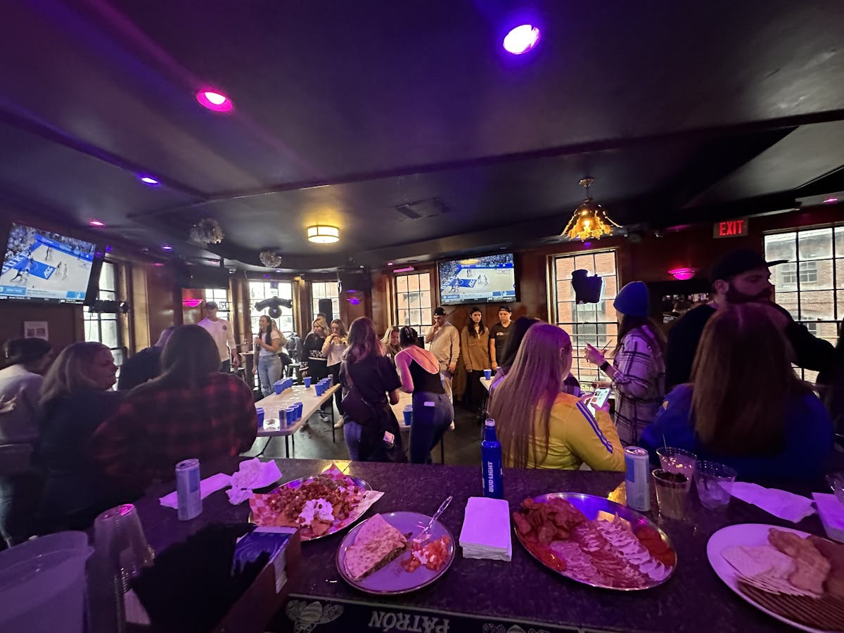 a group of people standing in a room