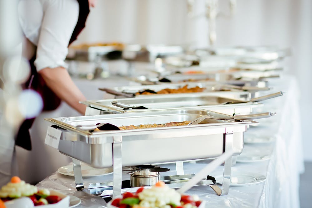 a person preparing food on a table