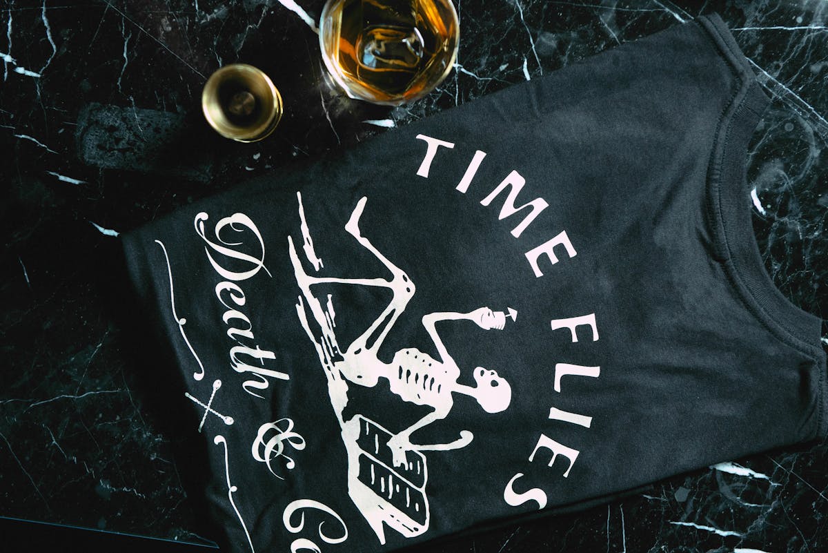 a black tshirt from death and co