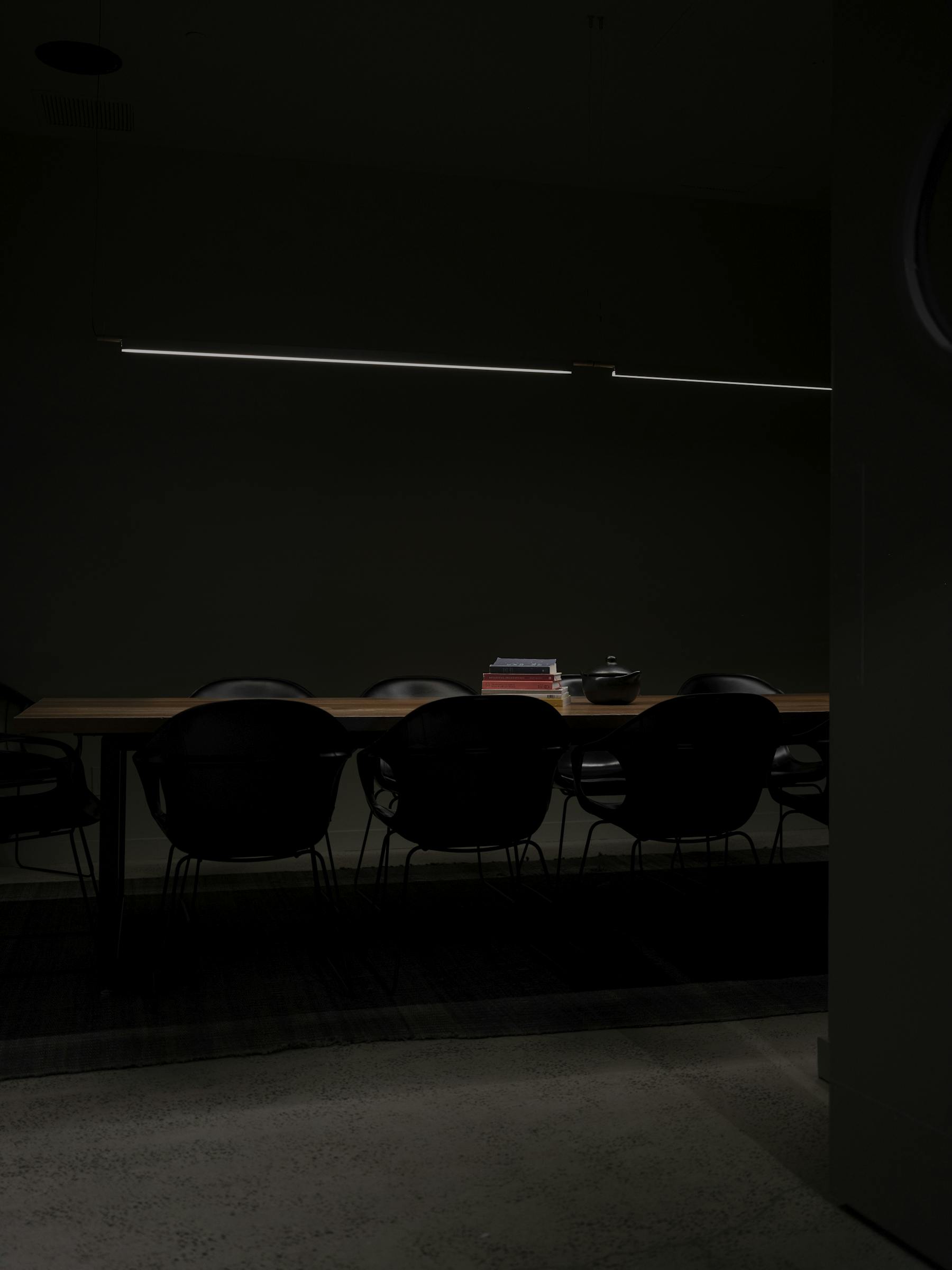 a bed in a dark room