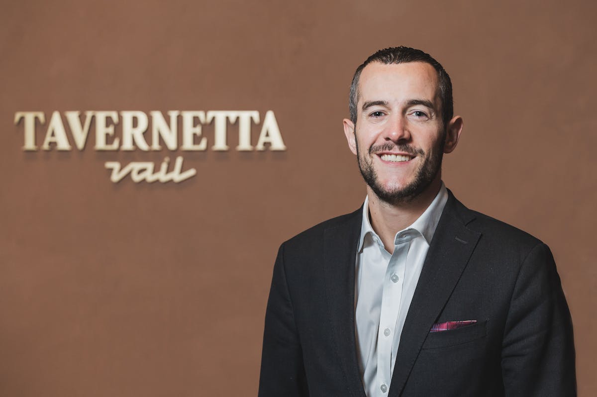 a man wearing a suit and tie