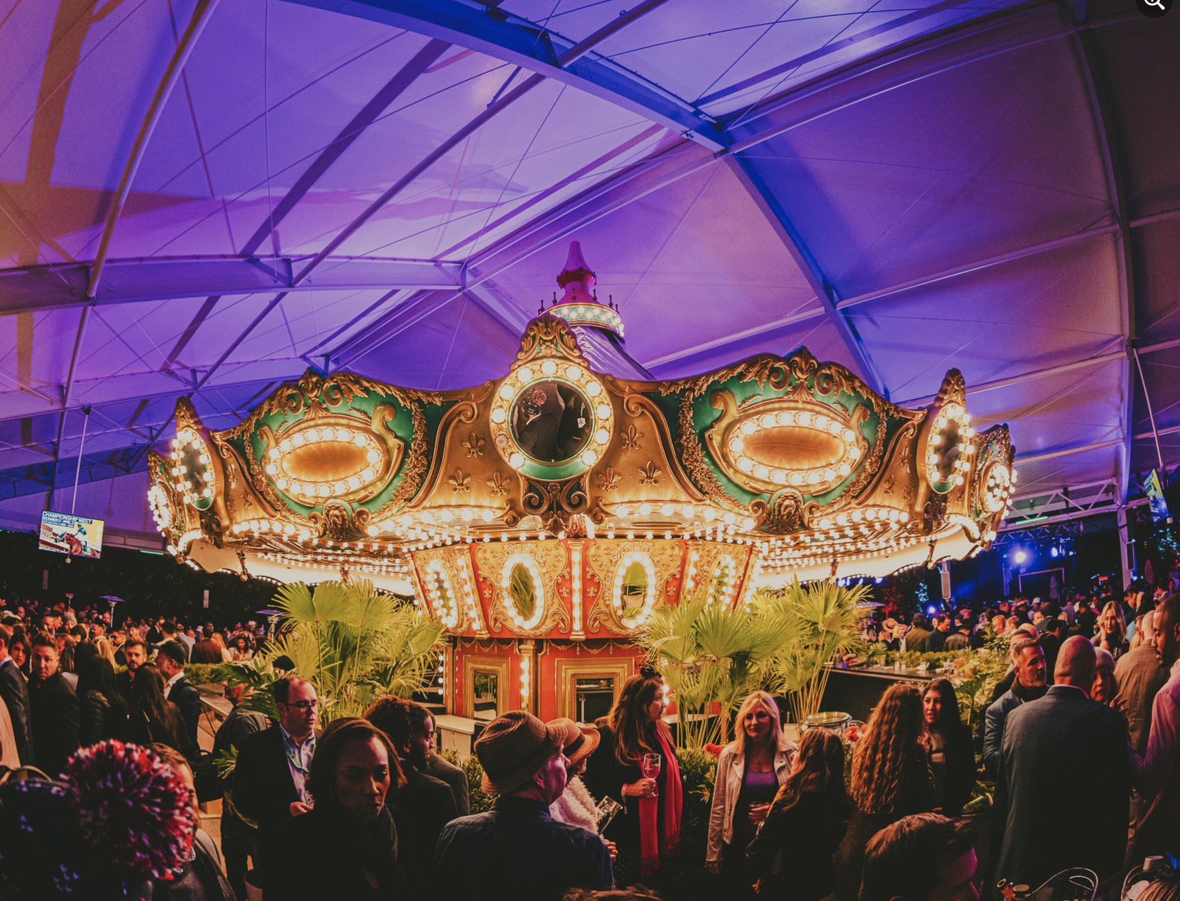 an umbrella hanging in front of a crowd