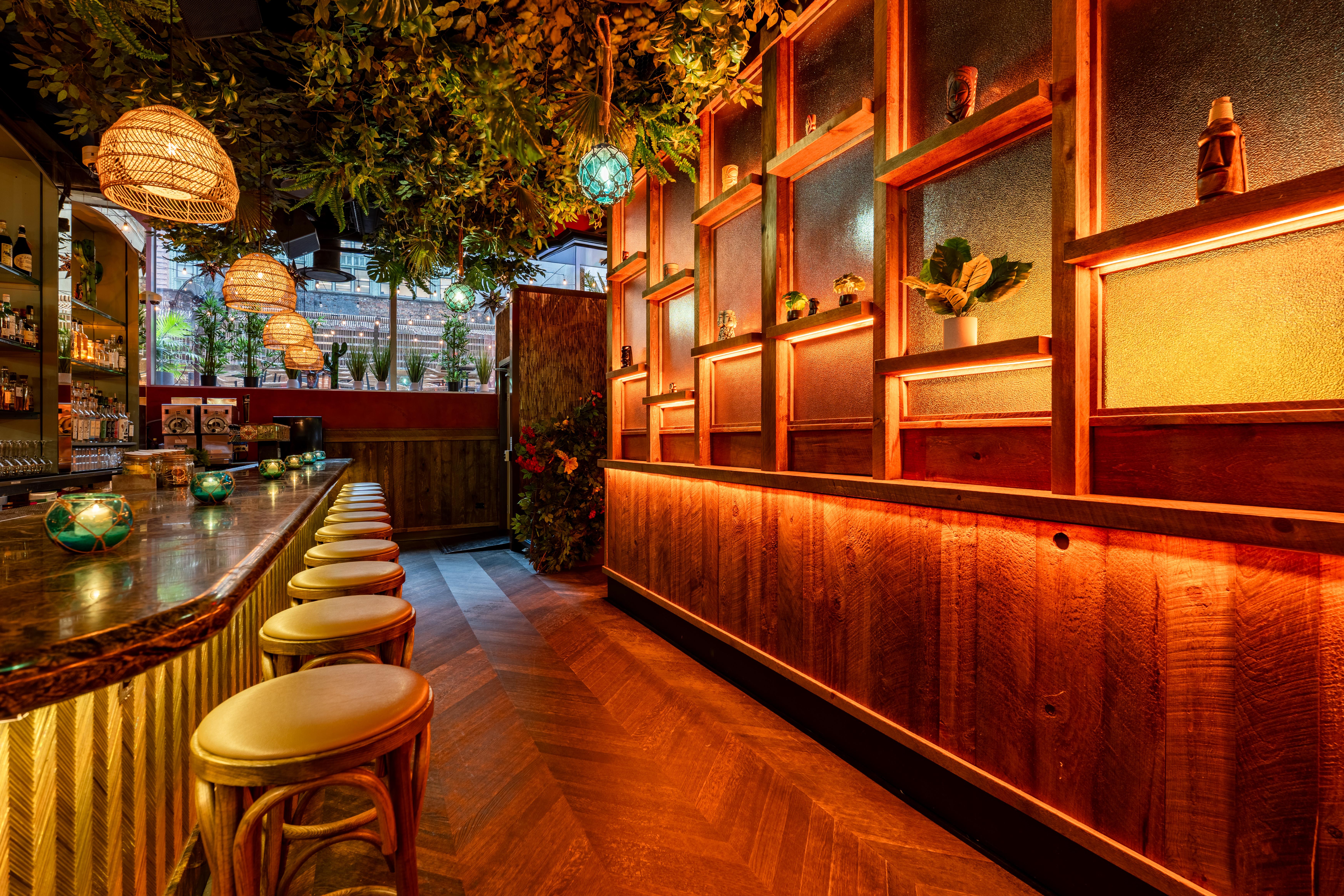 a room filled with furniture and a large mirror