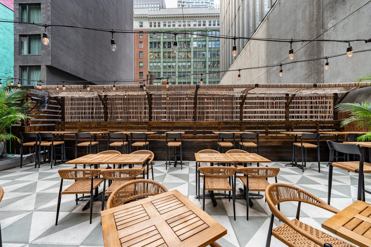 a dining room table in front of a building