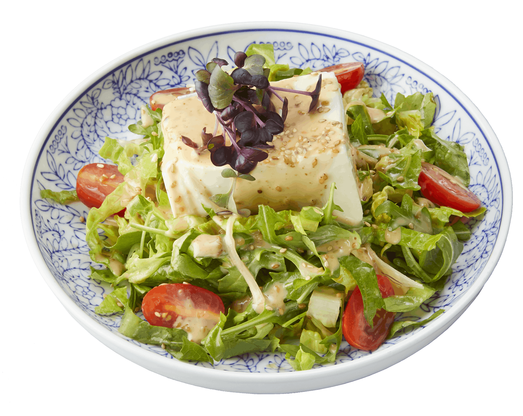 a plate of food with a green salad
