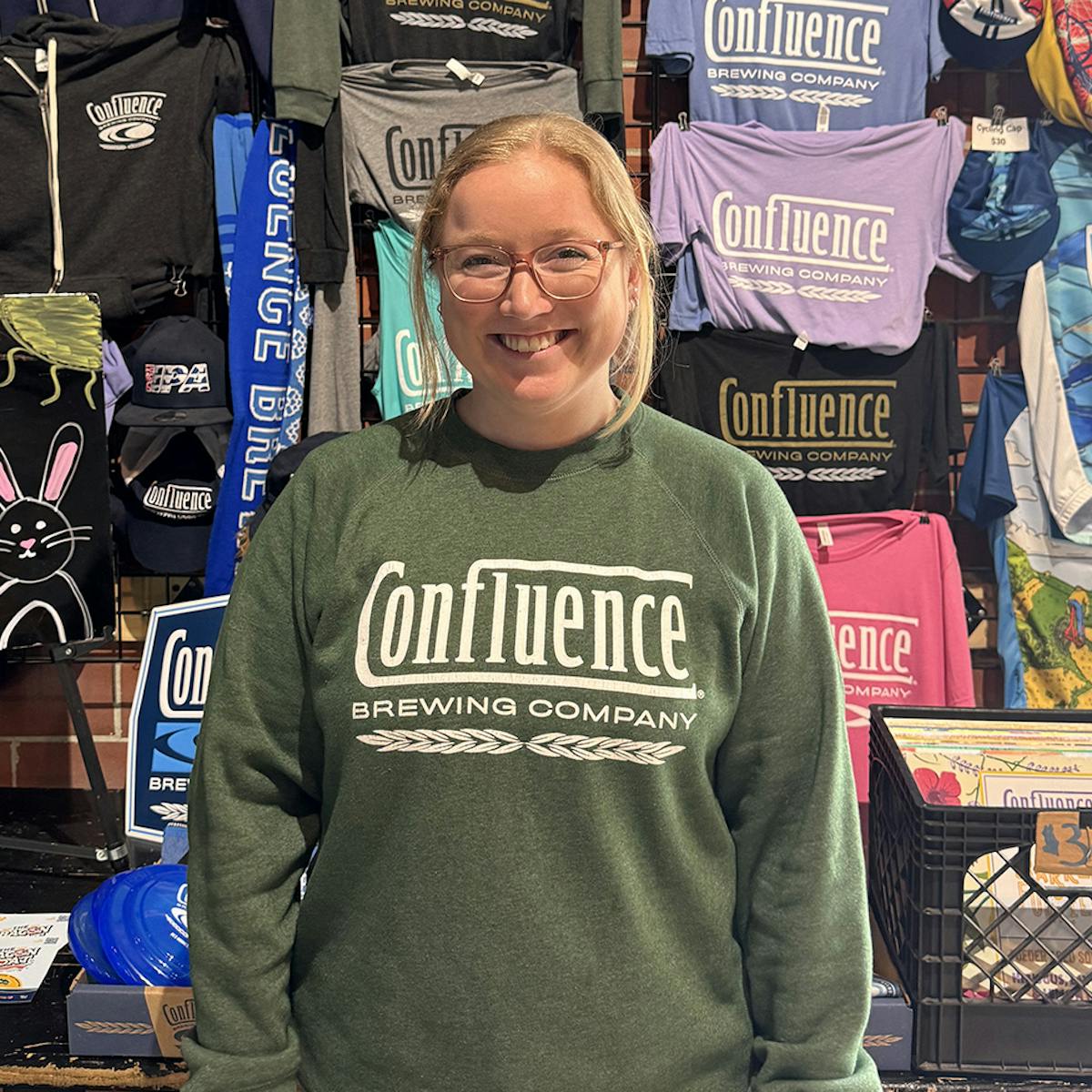 a person standing in front of a store