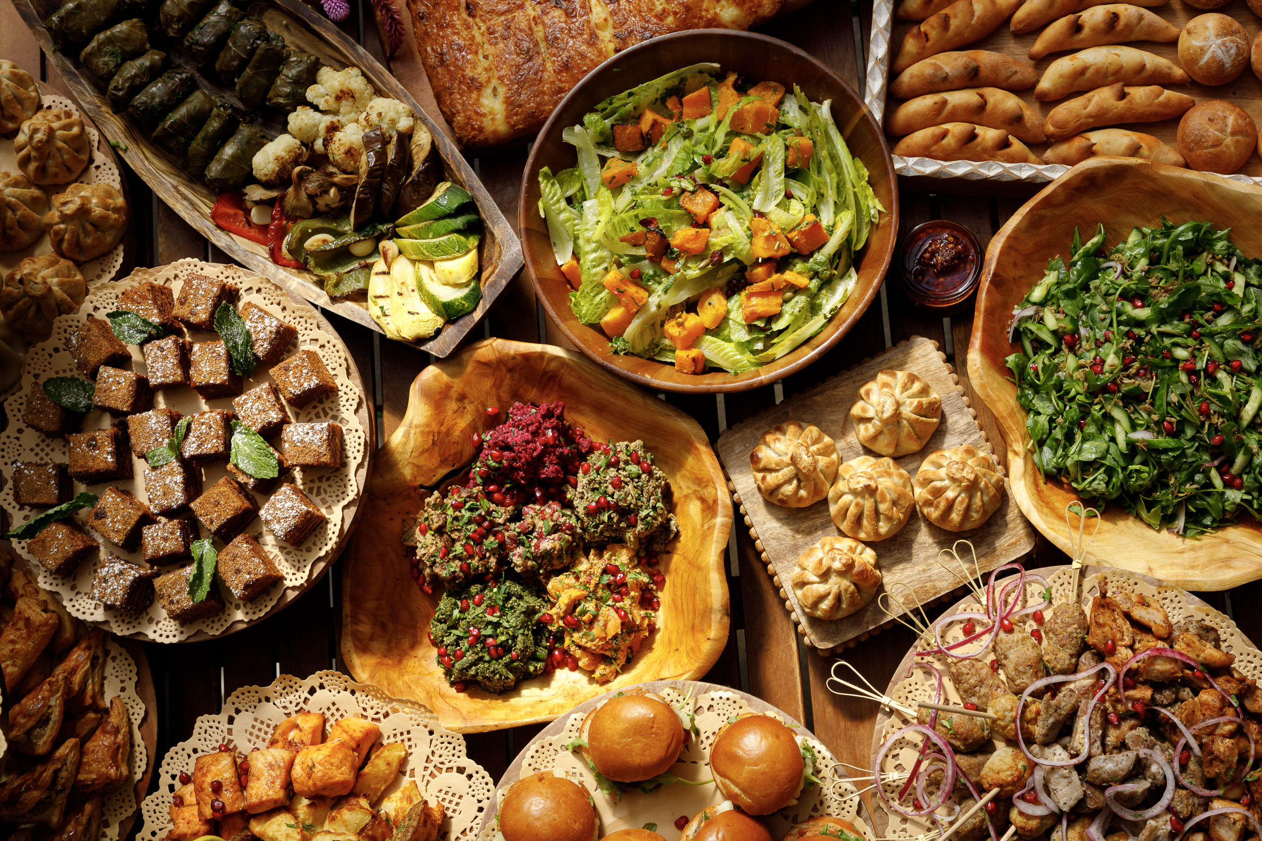 a bunch of different types of food on a table