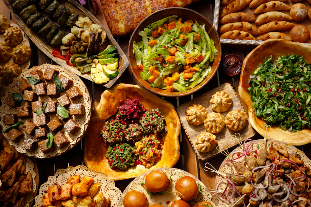 a bunch of different types of food on a table