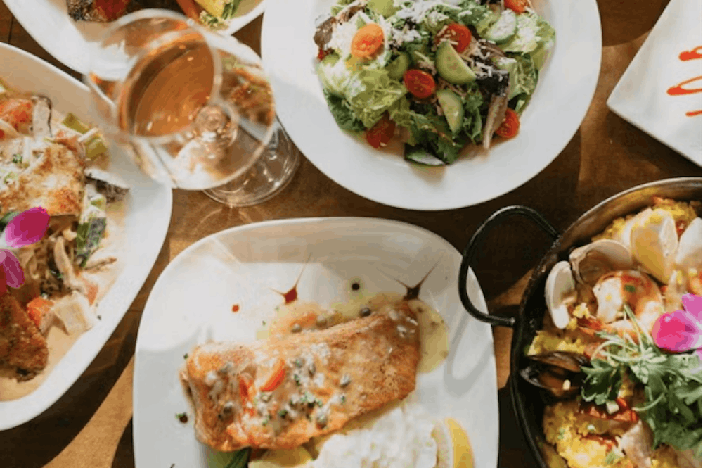 Seafood and salads on a table.