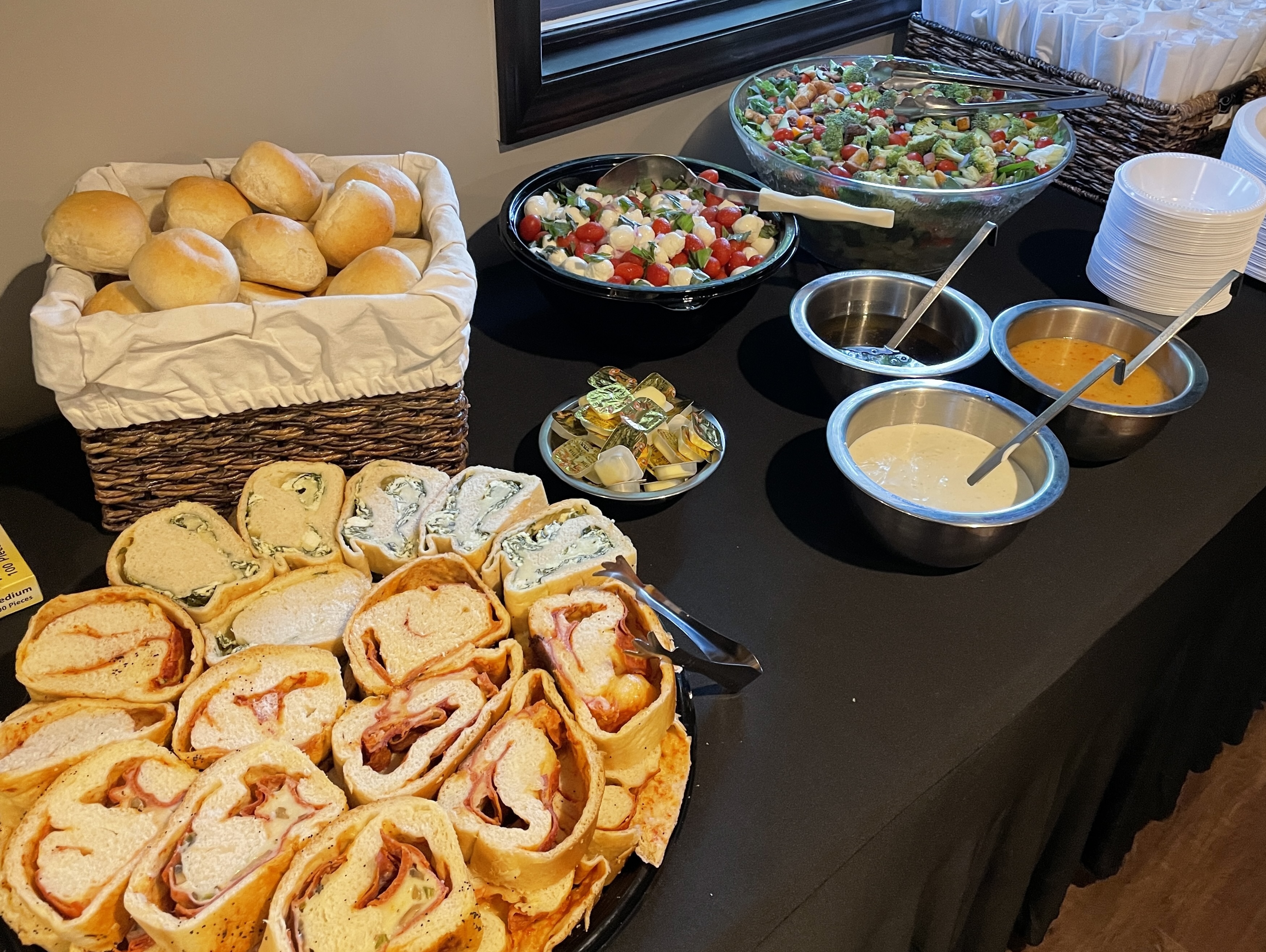 Stromboli, Caprese salad, dinner rolls