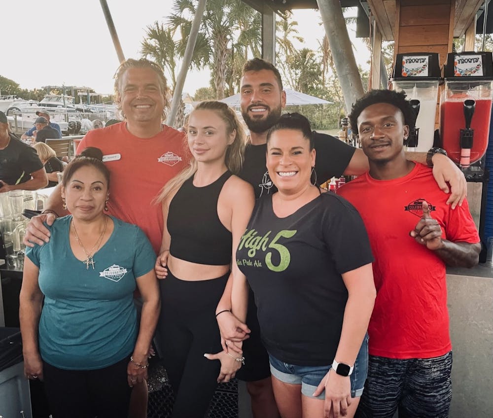 a group of people posing for a photo