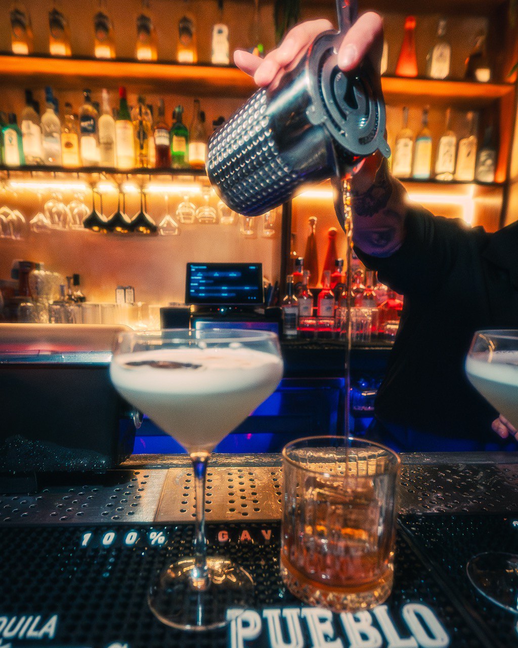 a cat sitting on top of a table