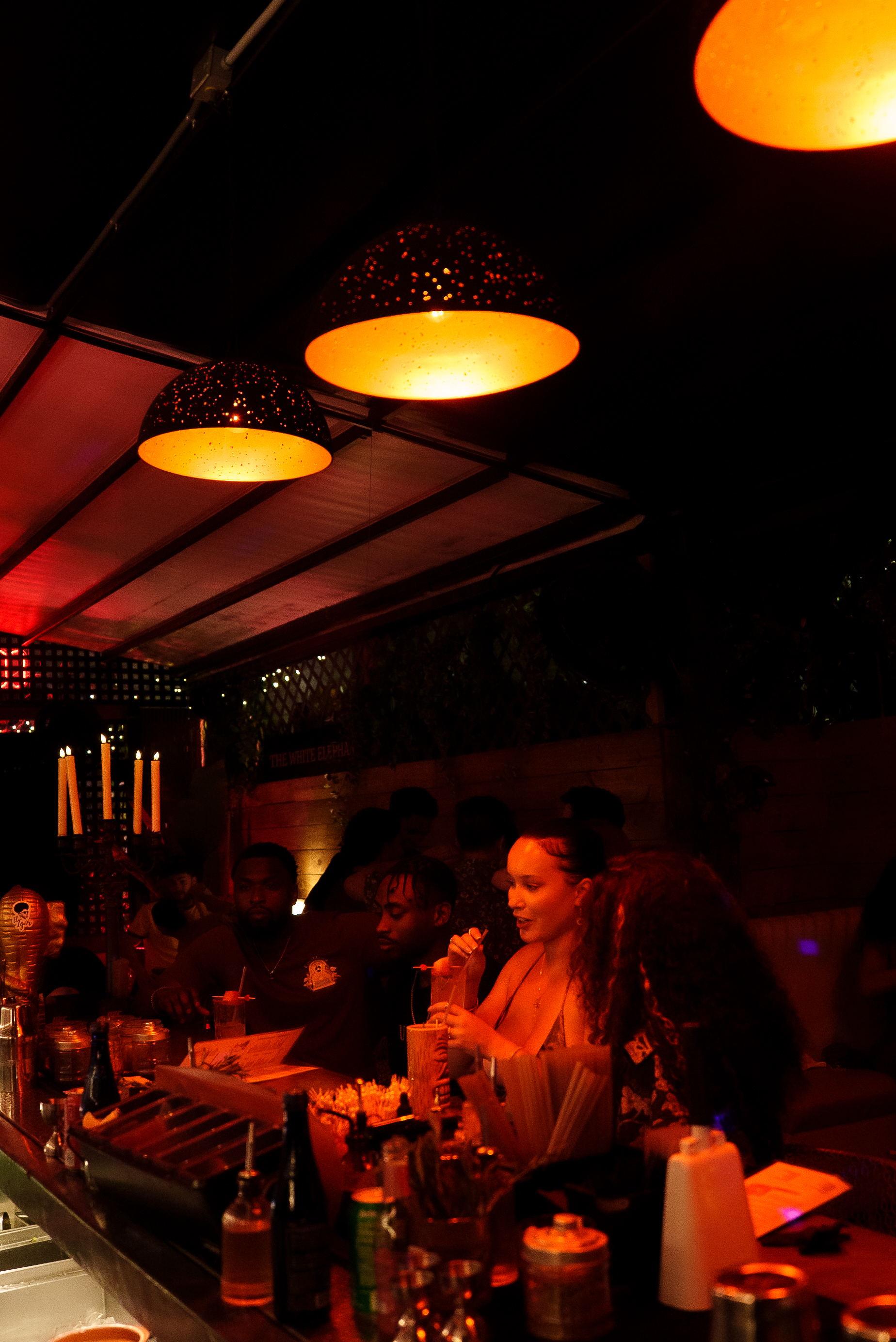 Enjoy the drink at The White Elephant Cocktail Bar