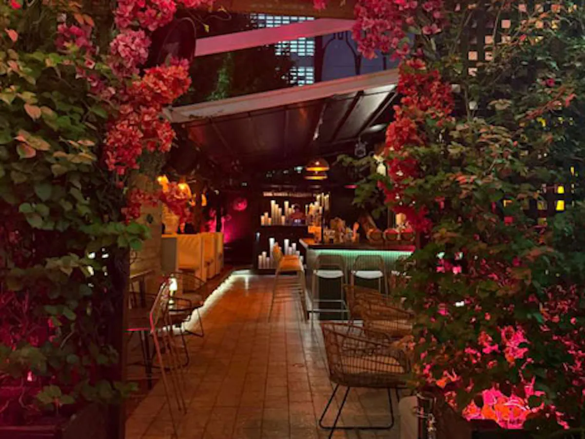 a restaurant with a bar and tables