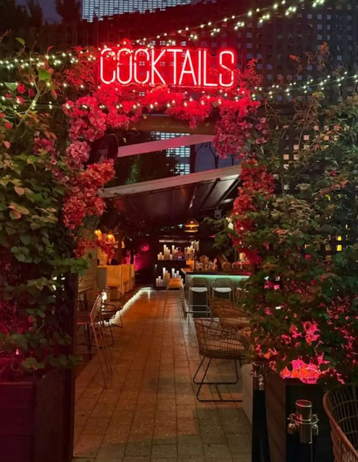 a neon sign over a restaurant