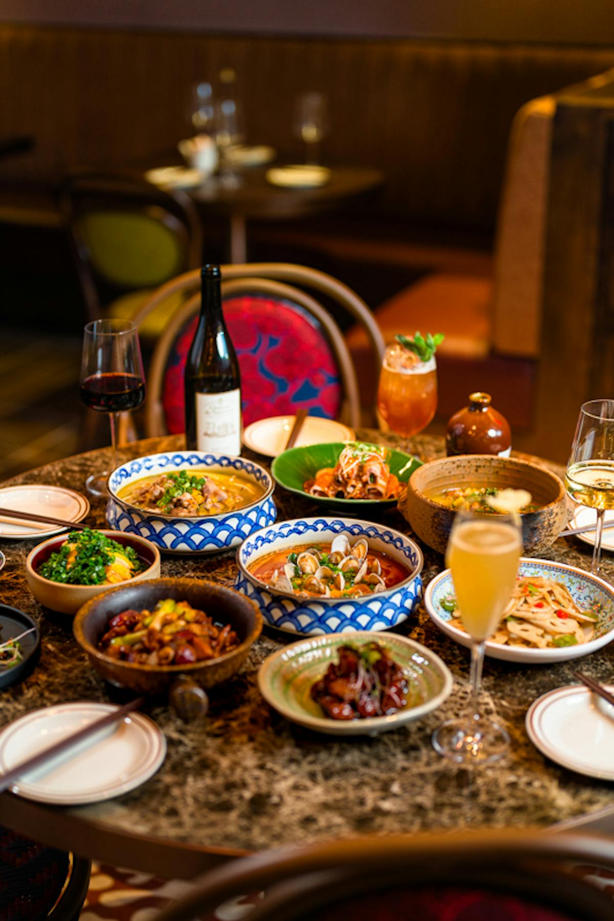 a table topped with plates of food