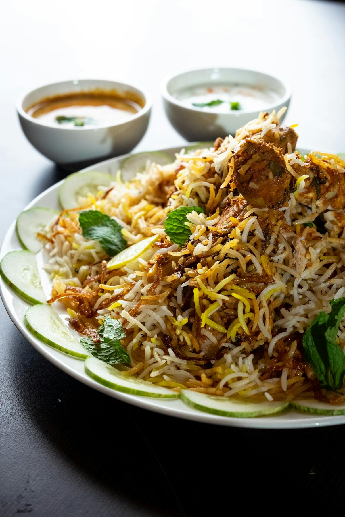 a plate of food with rice and broccoli