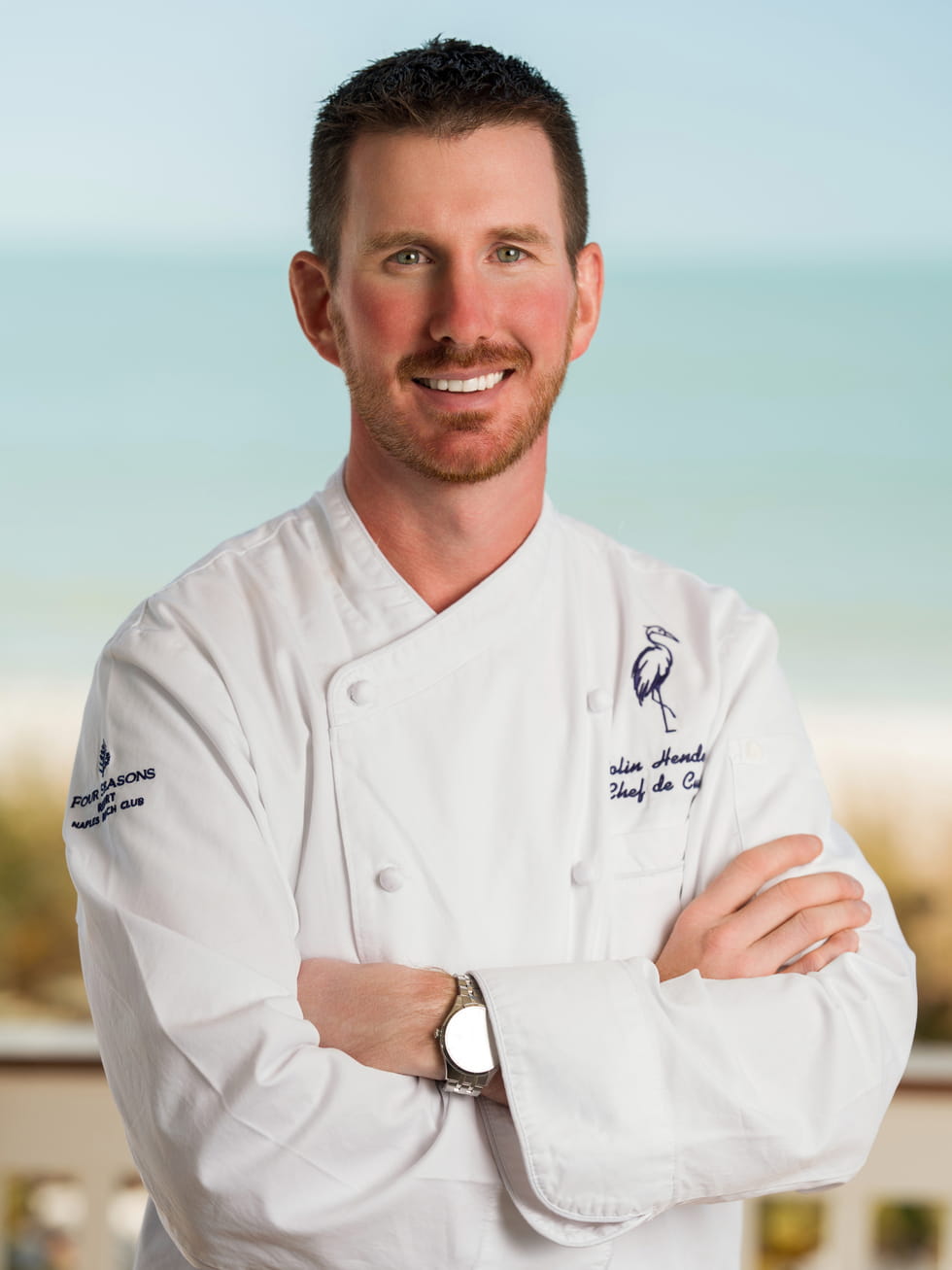 a man wearing a chef's coat