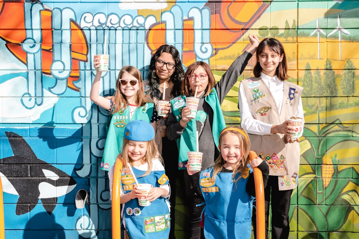 A group of girl scouts enjoying Next Level Burger