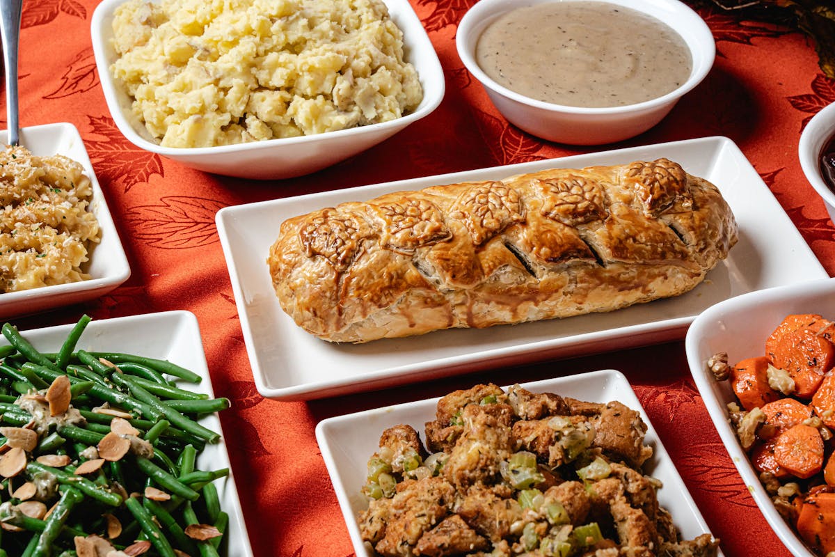 a box filled with different types of food on a plate