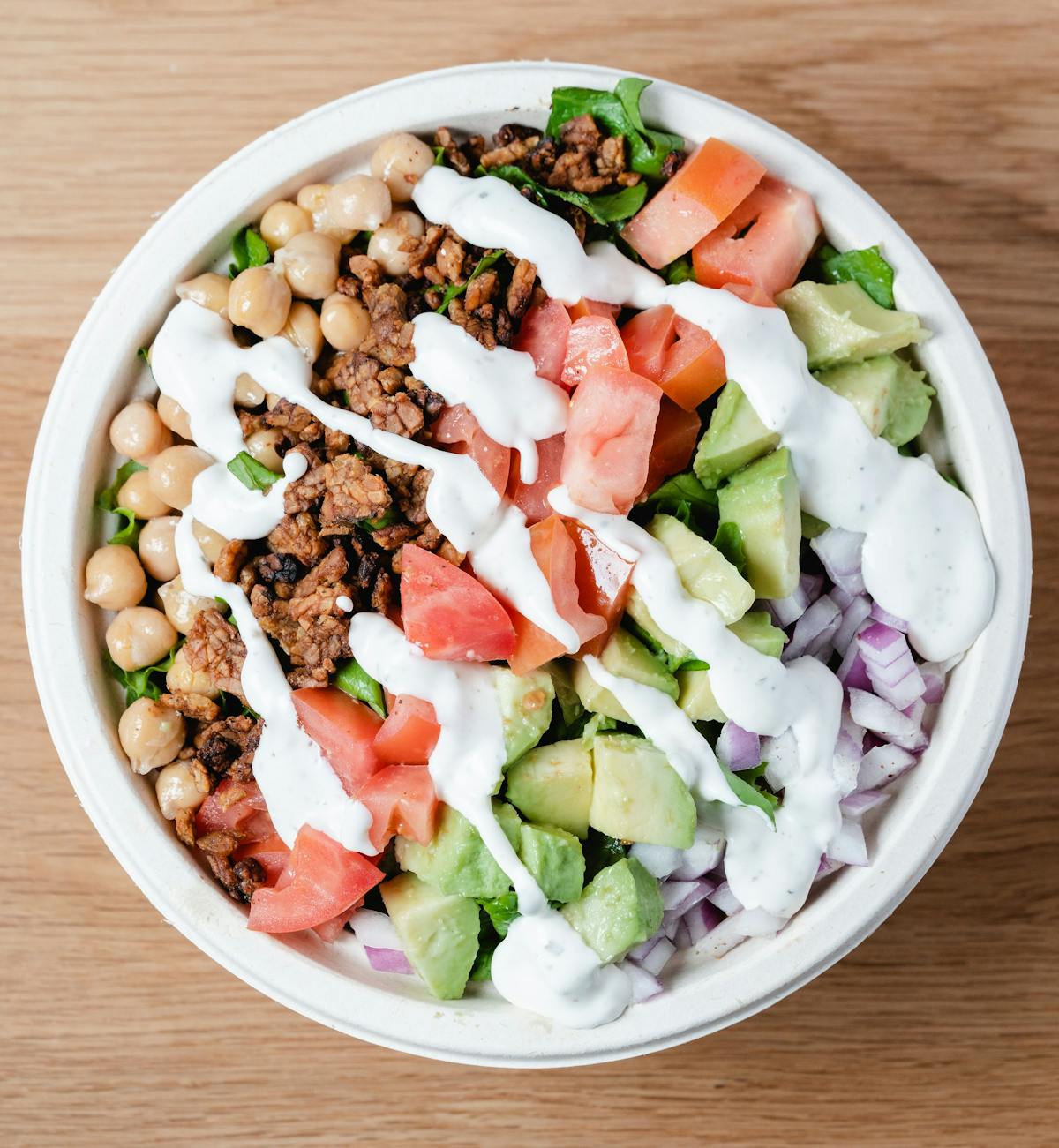 a bowl of salad on a plate