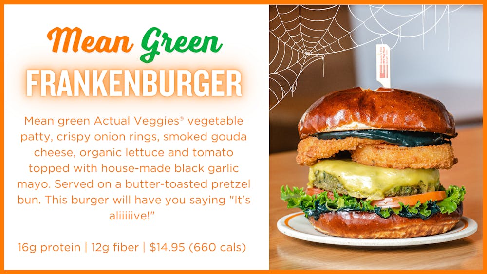 Mean green Actual Veggies® vegetable patty, crispy onion rings, smoked gouda cheese, organic lettuce and tomato topped with house-made black garlic mayo. Served on a butter-toasted pretzel bun. This burger will have you saying "It's aliiiiive!"   16g protein | 12g fiber | $14.95 (660 cals) 