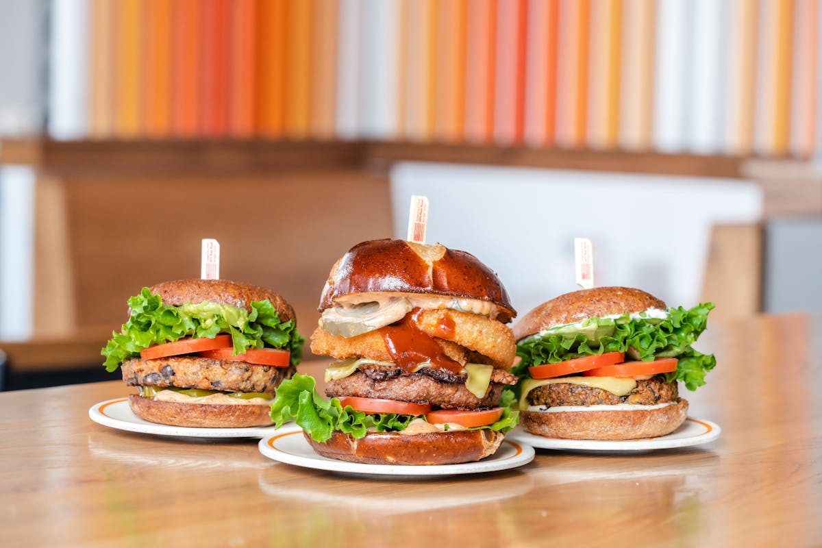 a sandwich sitting on top of a wooden table