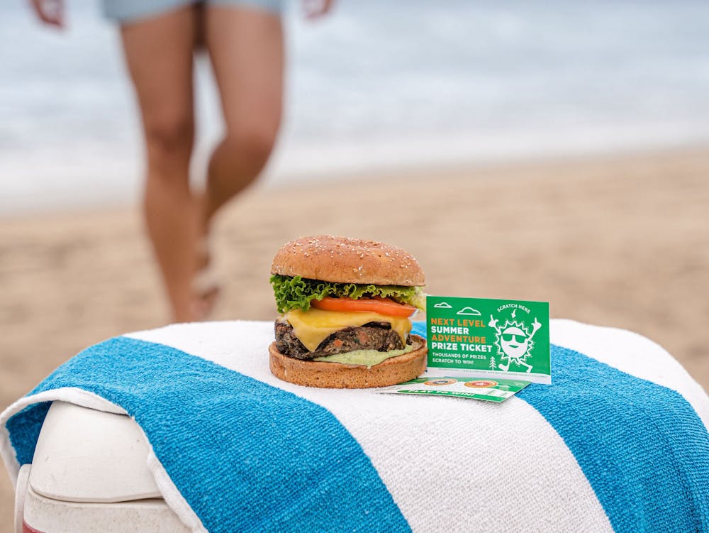 Redwood Truffle Burger and Next Level Summer Adventure Prize Ticket on the beach