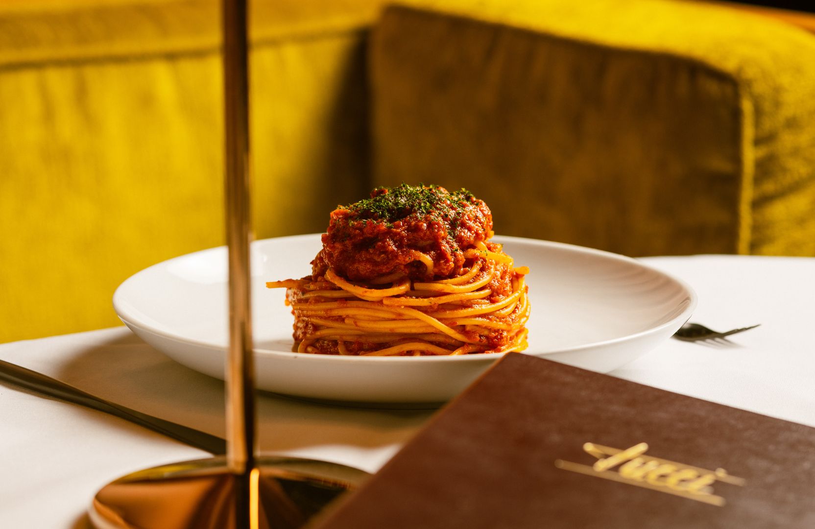 Italian pasta dish at Tucci NYC served in an upscale private dining setting