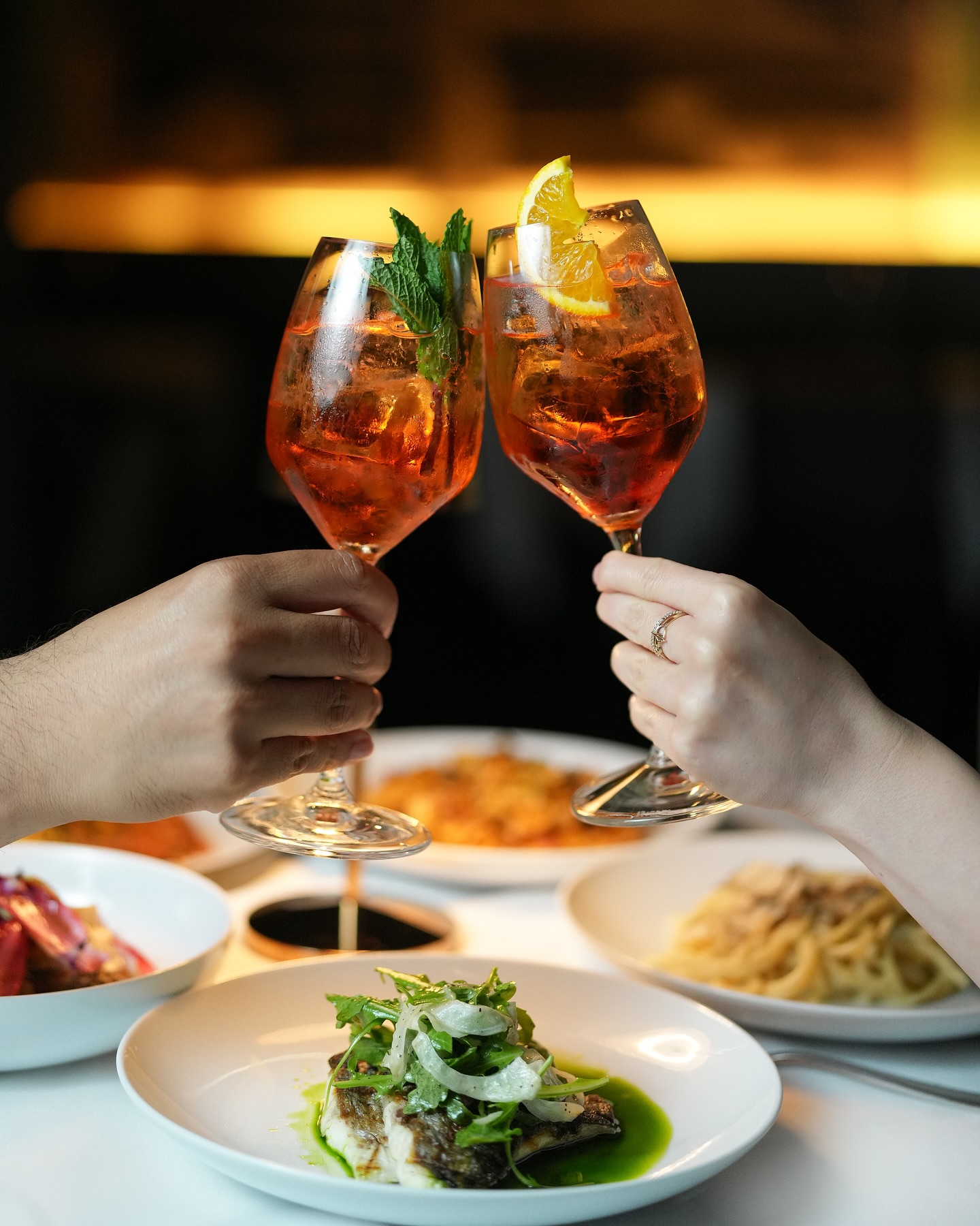 Classic cocktails and wine served at the bar at Tucci NYC, a date night restaurant in downtown Manhattan