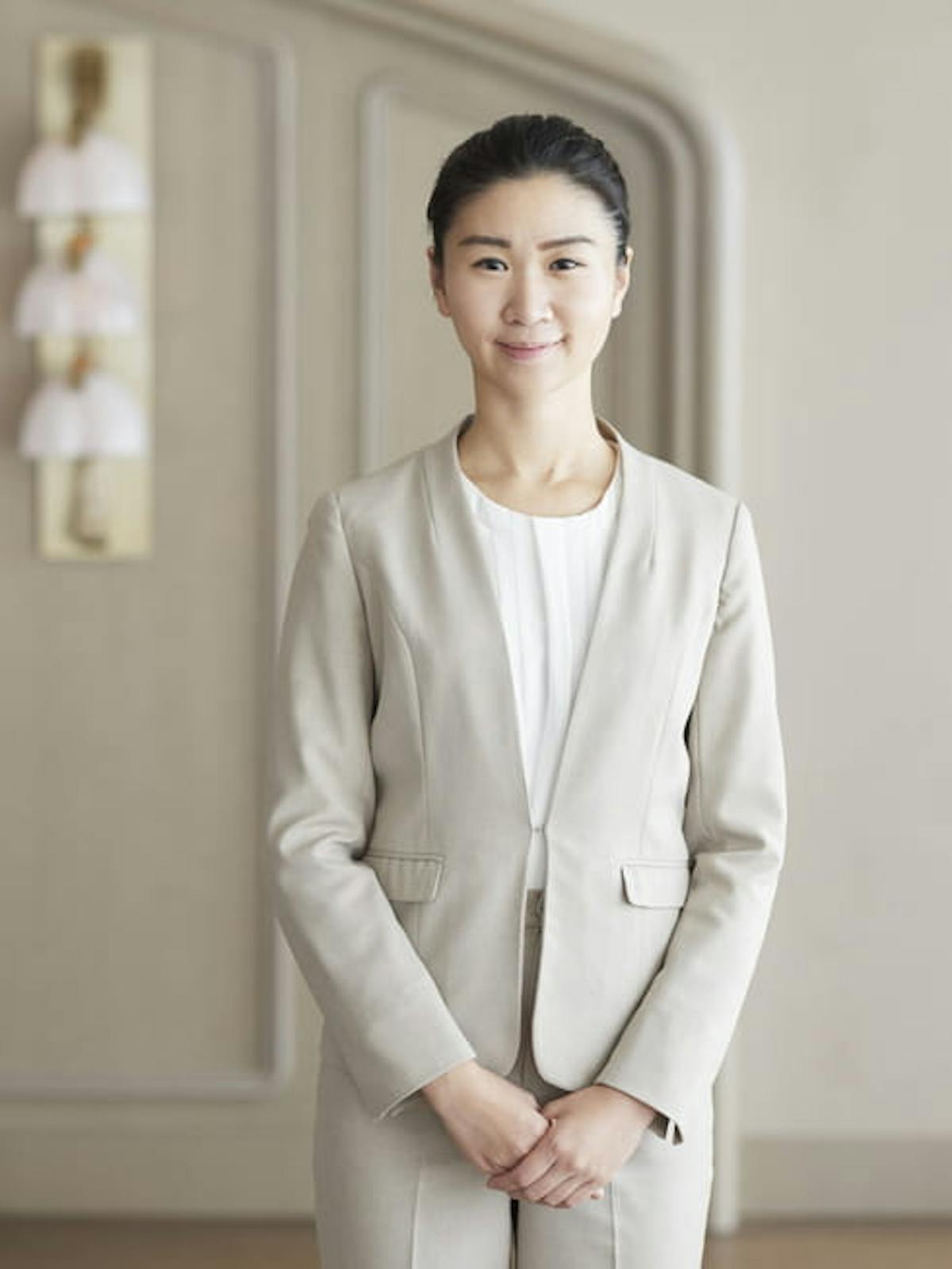 a person standing posing for the camera