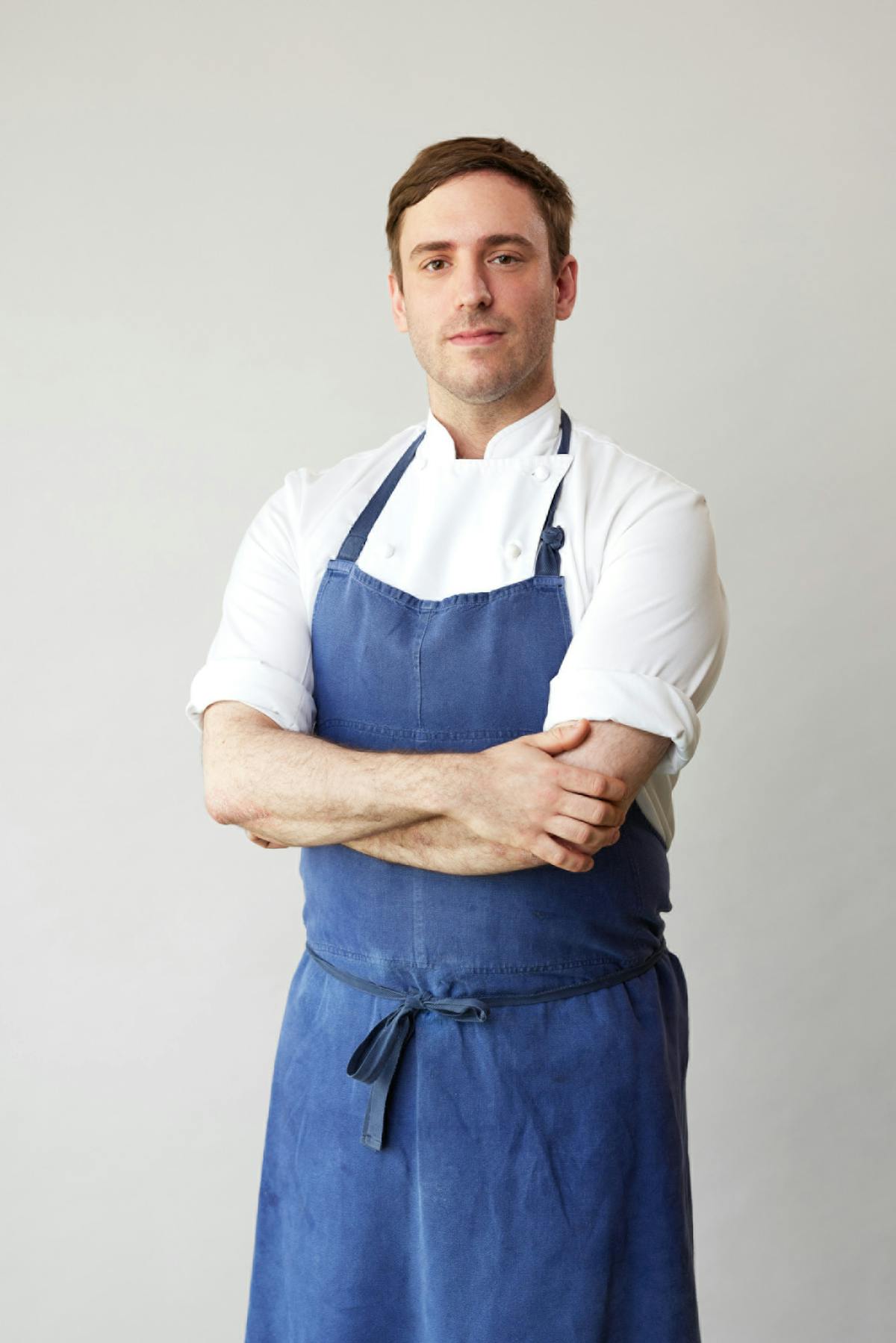a person standing posing for the camera