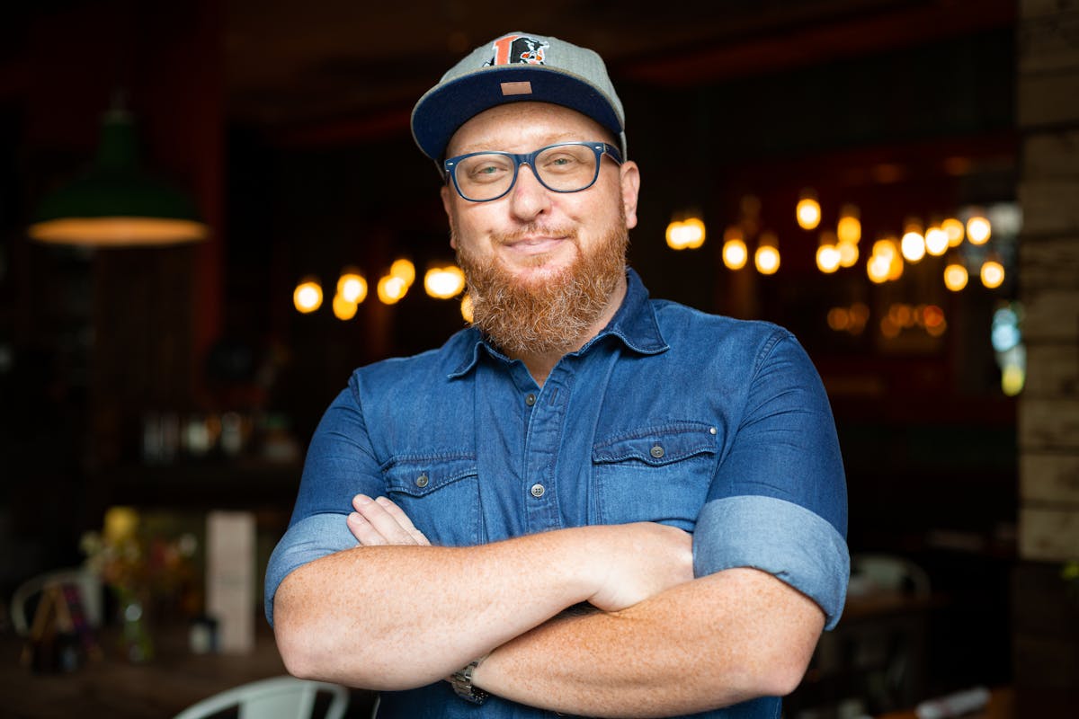 a man in a blue shirt