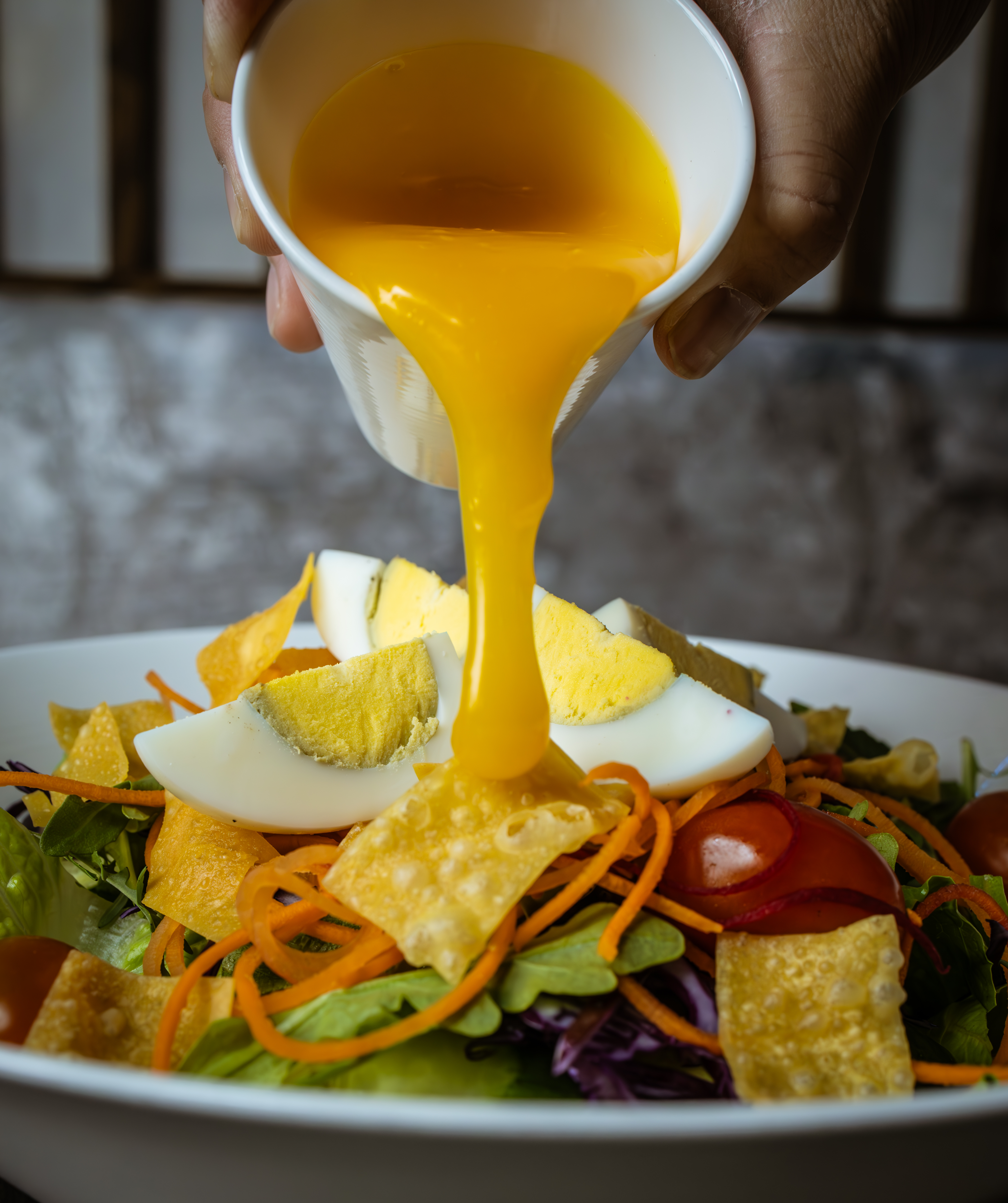 a nacho salad with cheese