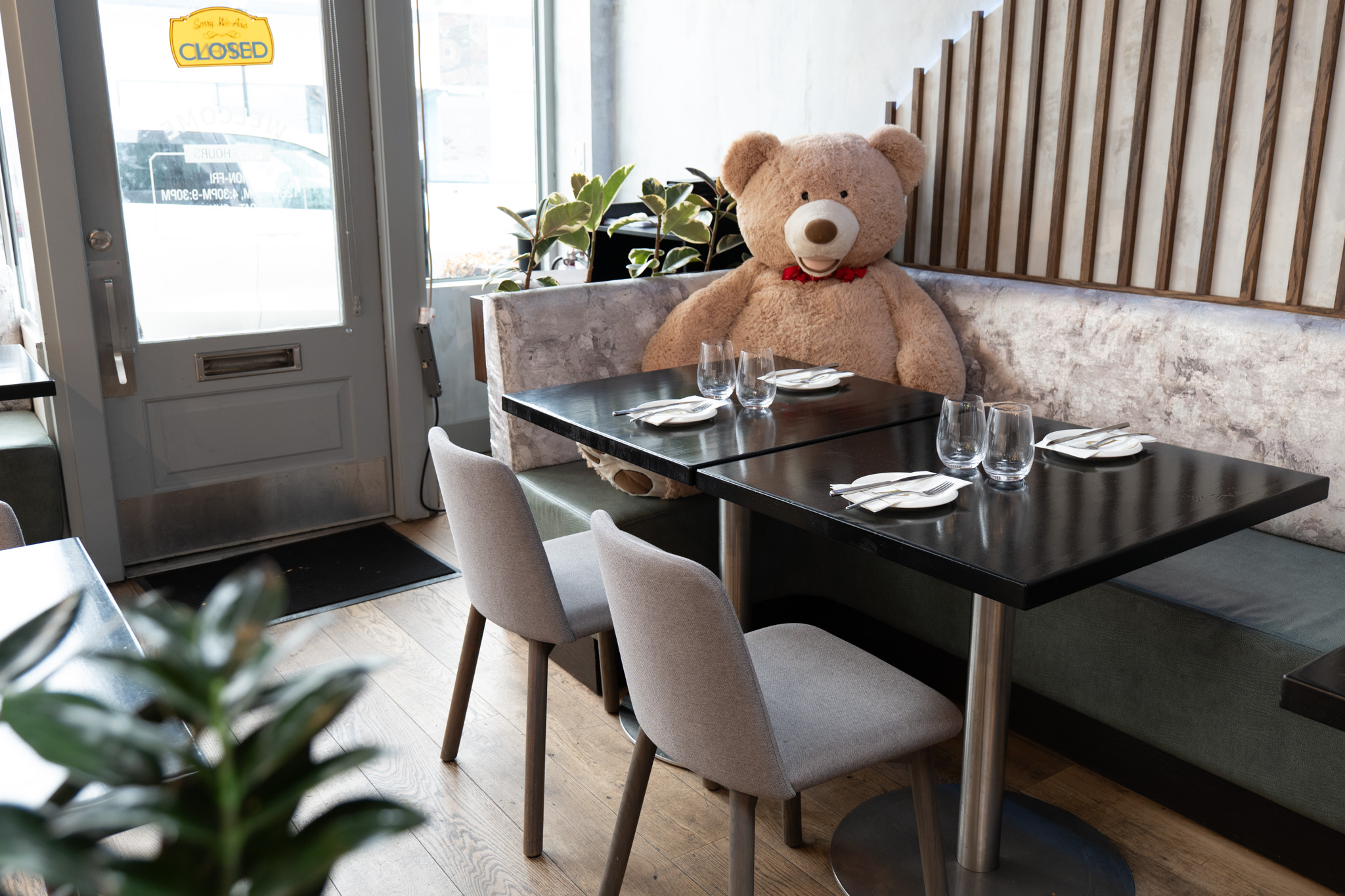 a teddy bear sitting on top of a table