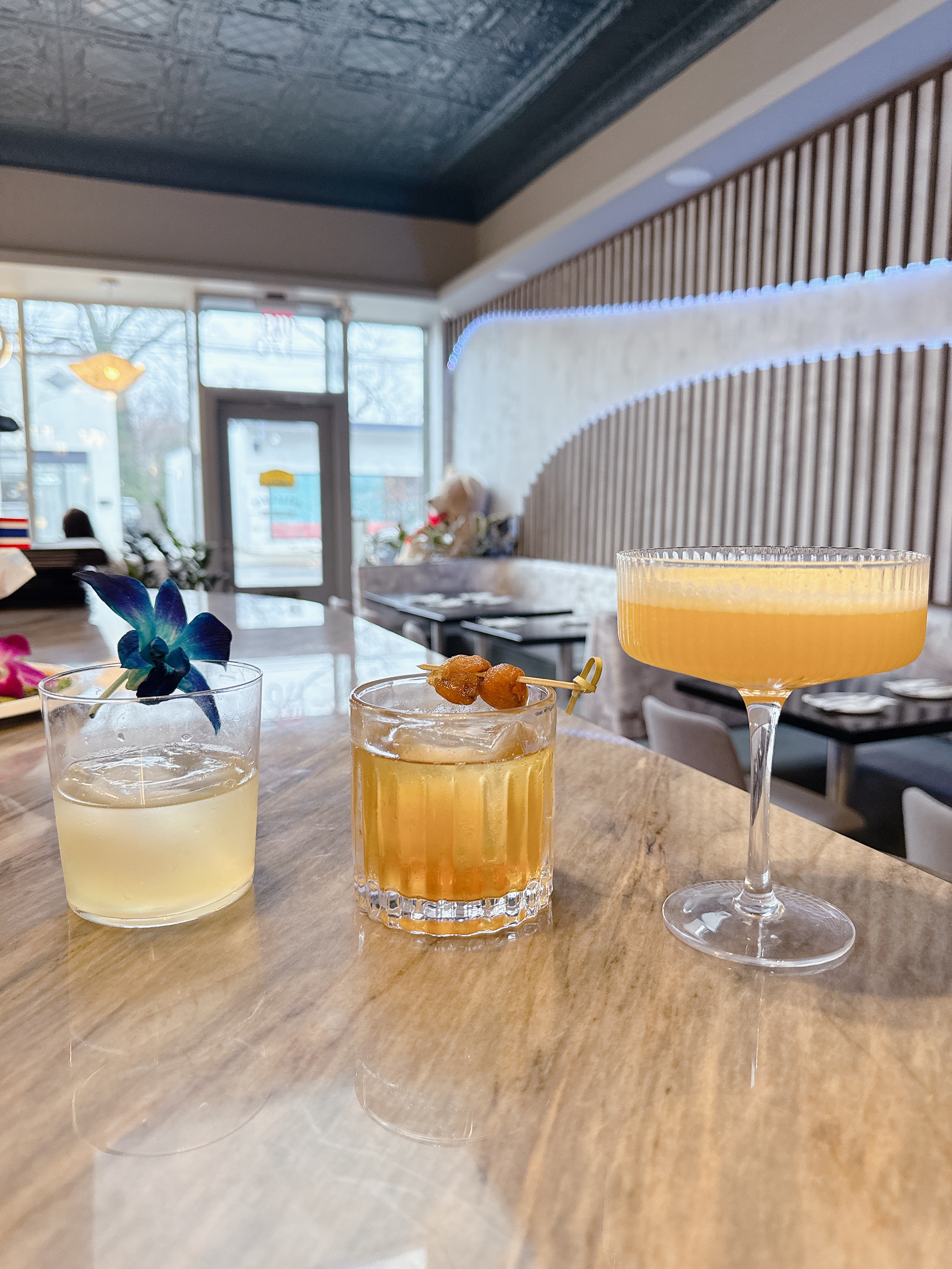 a glass of wine on a table