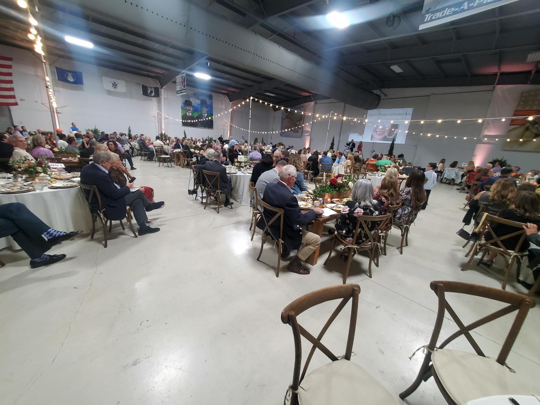 a group of people sitting at a table