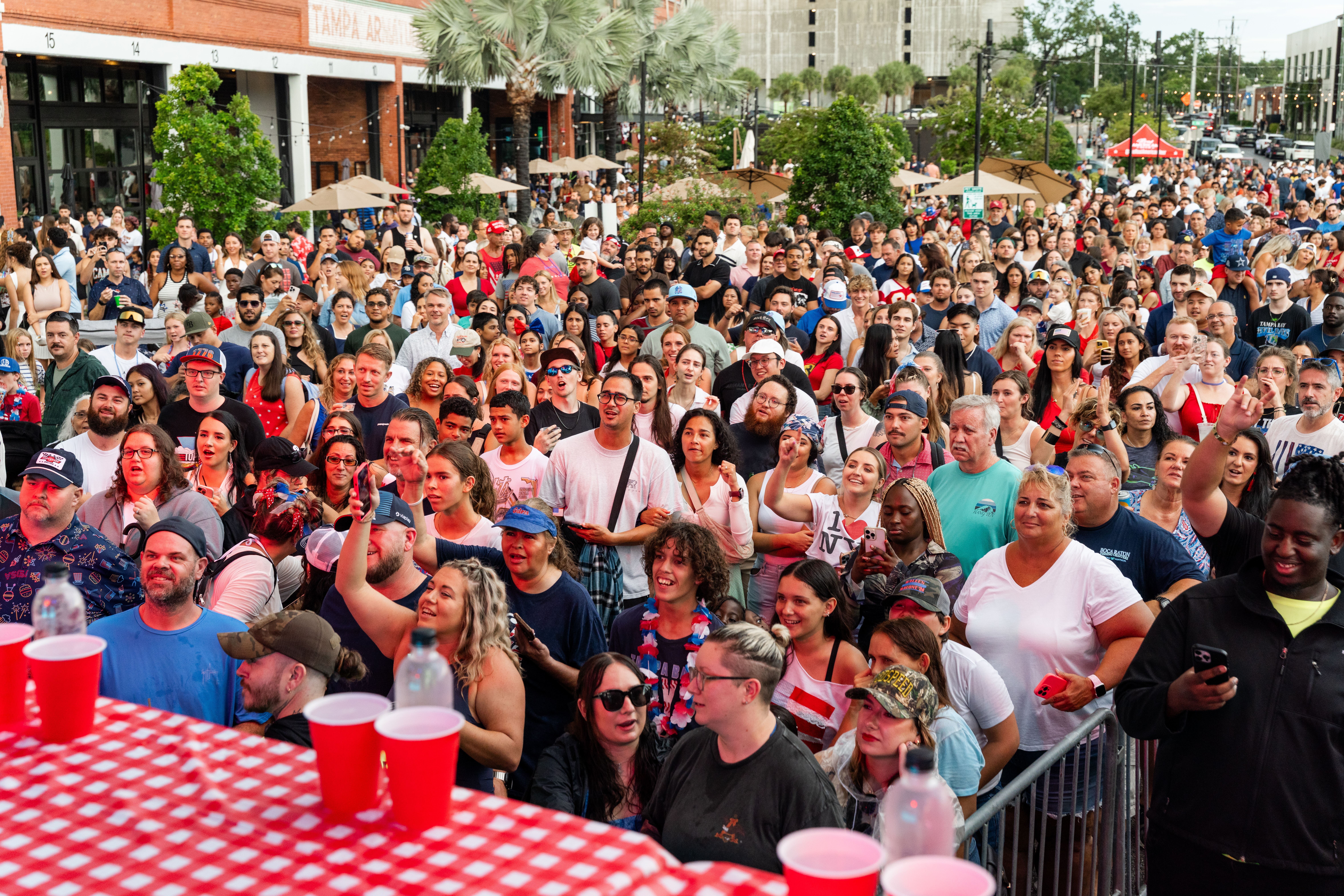 a large crowd of people standing in a crowd
