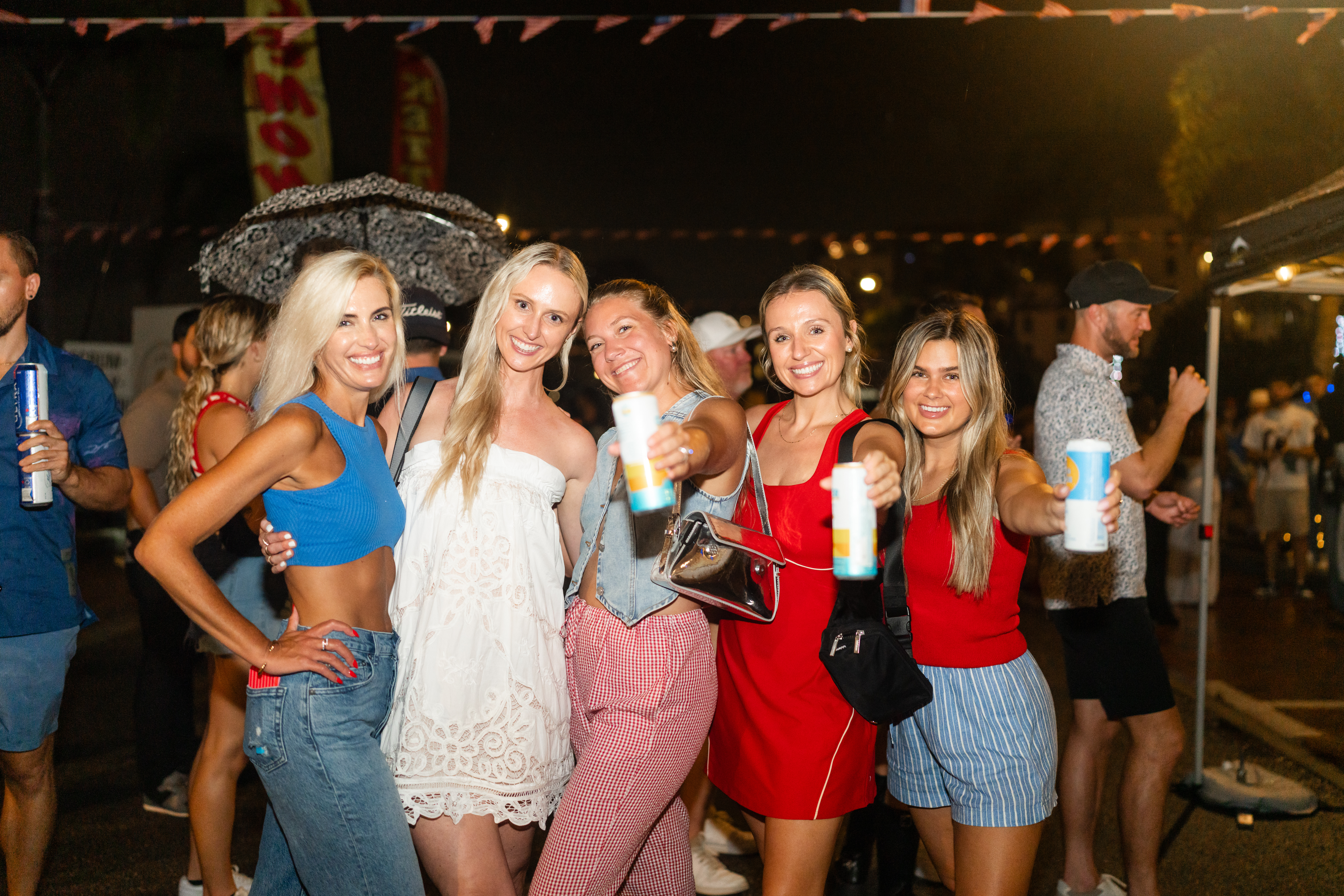 a group of women posing for a photo