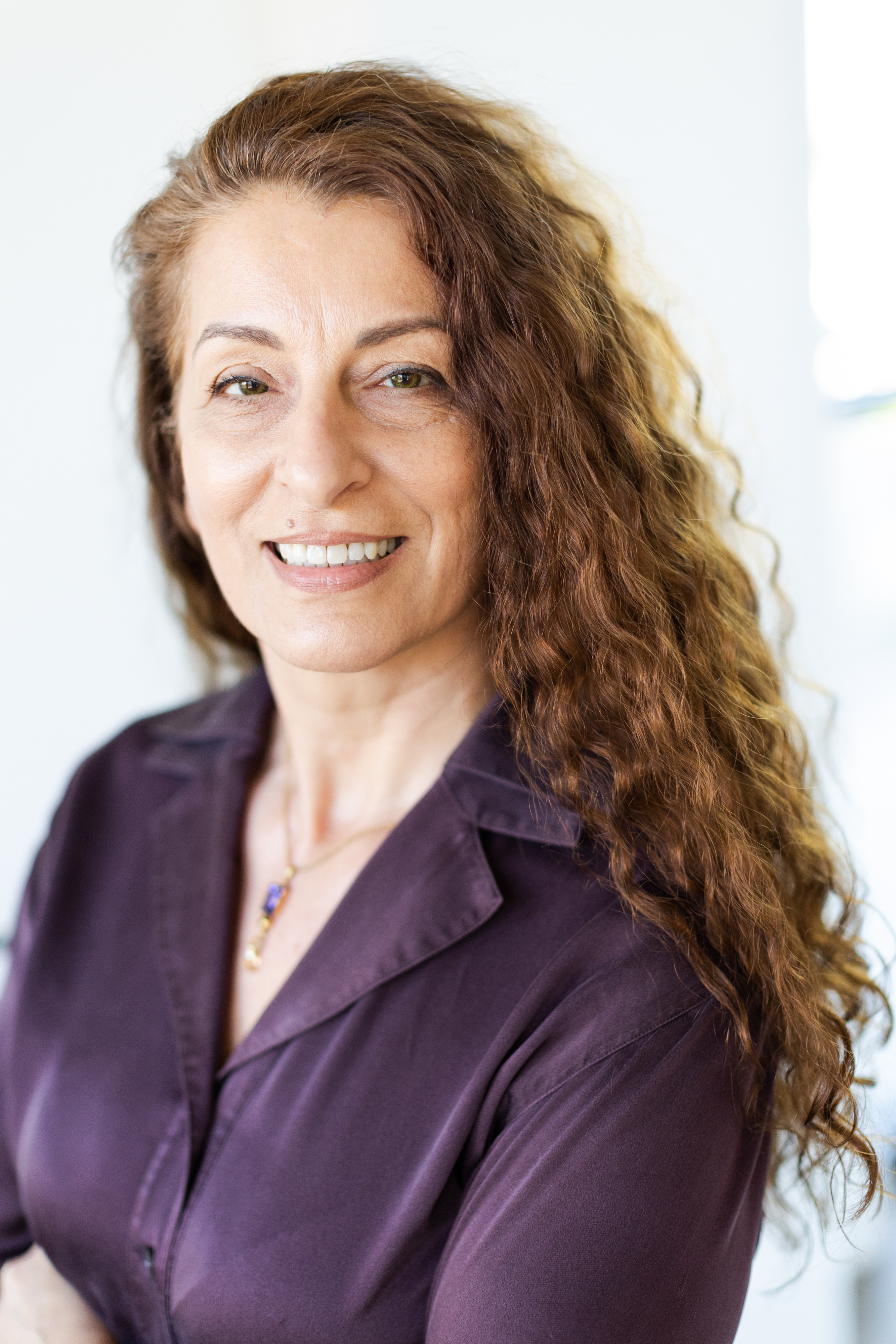 a woman smiling for the camera