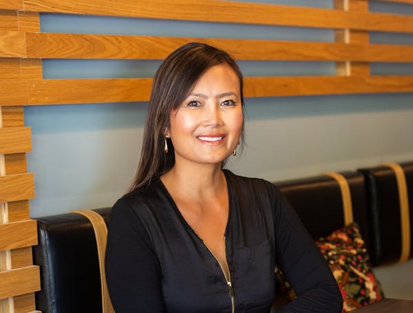a woman smiling for the camera